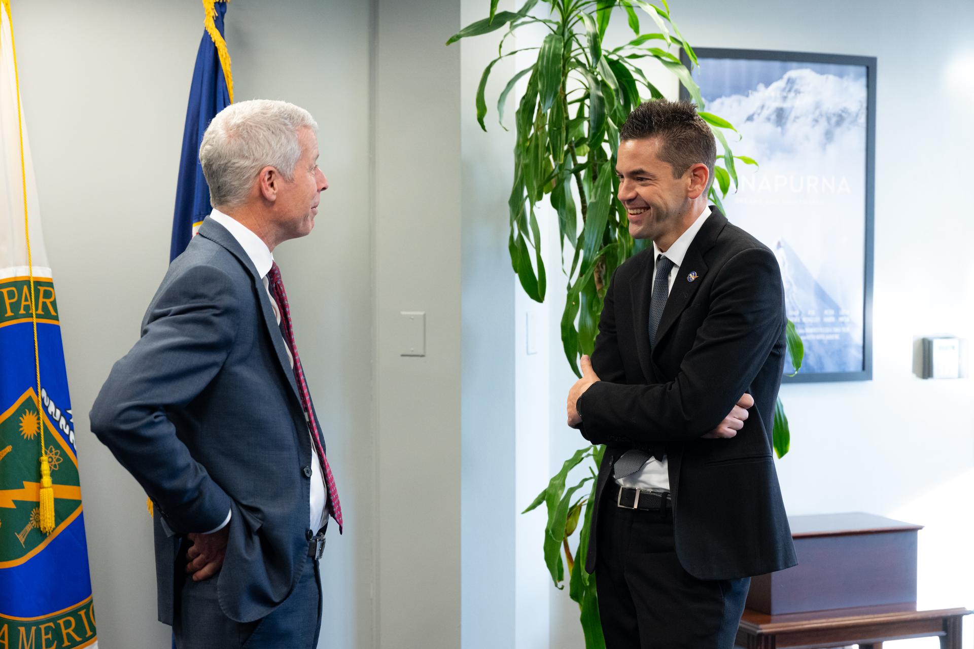U.S. Department of Energy Secretary Chris Wright, left, speaks to NASA Administrator Jared Isaacman, right, Thursday, Jan. 8, 2026, at the Department of Energy Headquarters in Washington. The DOE and NASA signed a memorandum of understanding to support the research and development of a fission surface power system for use on the Moon and future NASA missions to Mars. Photo Credit: (NASA/John Kraus)