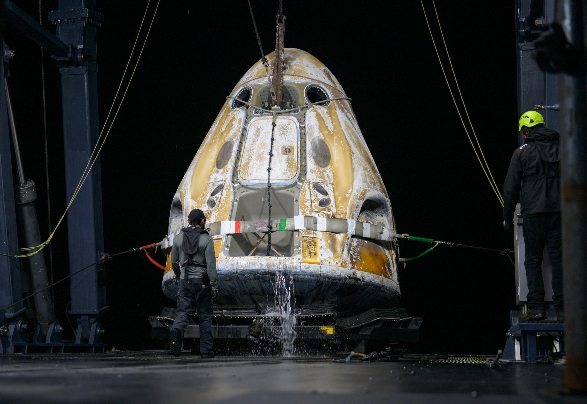 Support teams onboard the SpaceX recovery ship SHANNON work around the SpaceX Dragon Endeavour spacecraft shortly after it landed with NASA astronauts Zena Cardman, Mike Fincke, JAXA (Japan Aerospace Exploration Agency) astronaut Kimiya Yui, and Roscosmos cosmonaut Oleg Platonov aboard in the Pacific Ocean off the coast of San Diego, Calif., Thursday, Jan. 15, 2026. Cardman, Fincke, Yui, Platonov are returning after 167 days in space as part of Expedition 74 aboard the International Space Station. Photo Credit: (NASA/Bill Ingalls)