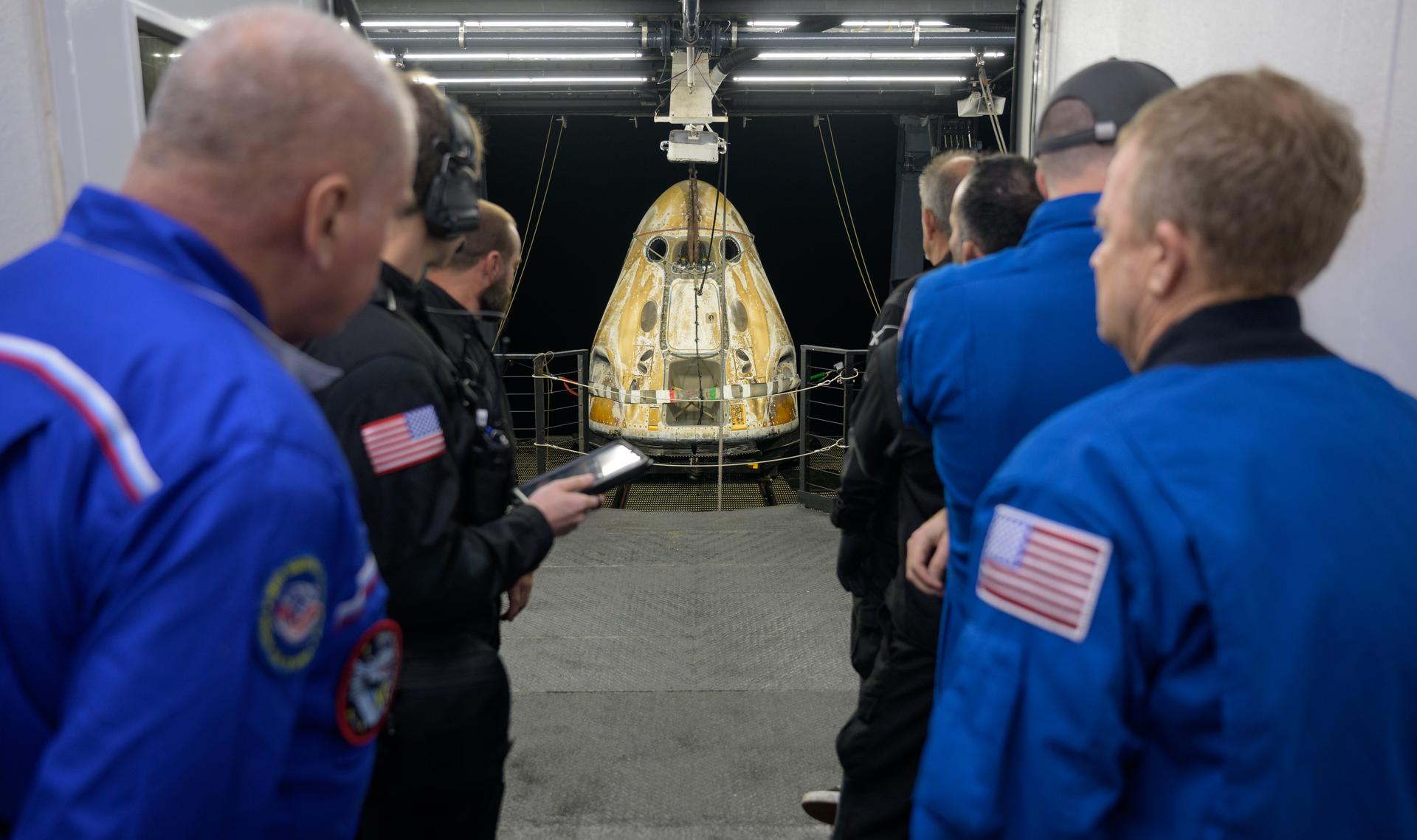 Support teams onboard the SpaceX recovery ship SHANNON work around the SpaceX Dragon Endeavour spacecraft shortly after it landed with NASA astronauts Zena Cardman, Mike Fincke, JAXA (Japan Aerospace Exploration Agency) astronaut Kimiya Yui, and Roscosmos cosmonaut Oleg Platonov aboard in the Pacific Ocean off the coast of San Diego, Calif., Thursday, Jan. 15, 2026. Cardman, Fincke, Yui, Platonov are returning after 167 days in space as part of Expedition 74 aboard the International Space Station. Photo Credit: (NASA/Bill Ingalls)
