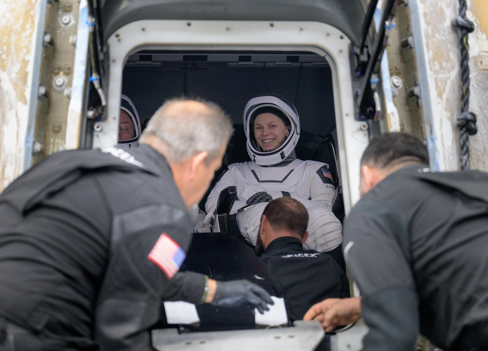 NASA astronaut Zena Cardman is seen inside the SpaceX Dragon Endeavour spacecraft onboard the SpaceX recovery ship SHANNON after she, NASA astronaut Mike Fincke, JAXA (Japan Aerospace Exploration Agency) astronaut Kimiya Yui, and Roscosmos cosmonaut Oleg Platonov landed in the Pacific Ocean off the coast of San Diego, Calif., Thursday, Jan. 15, 2026. Cardman, Fincke, Yui, Platonov are returning after 167 days in space as part of Expedition 74 aboard the International Space Station. Photo Credit: (NASA/Bill Ingalls)