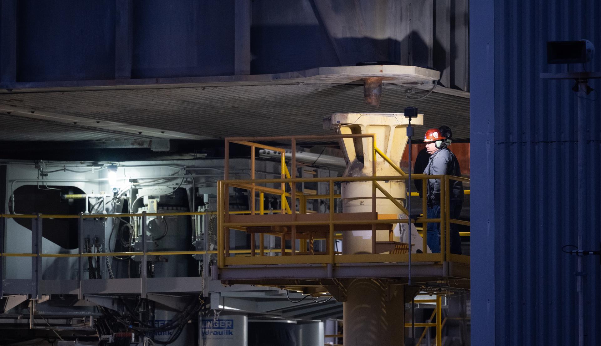 The mobile launcher with NASA’s Artemis II Space Launch System (SLS) rocket and Orion spacecraft secured to it is seen after being lifted by crawler-transporter 2 inside the Vehicle Assembly Building in preparation for rolling out to Launch Pad 39B, Saturday, Jan. 17, 2026, at NASA’s Kennedy Space Center in Florida. NASA’s Artemis II test flight will take Commander Reid Wiseman, Pilot Victor Glover, and Mission Specialist Christina Koch from NASA, and Mission Specialist Jeremy Hansen from the CSA (Canadian Space Agency), around the Moon and back to Earth no later than April 2026. Photo Credit: (NASA/Joel Kowsky)