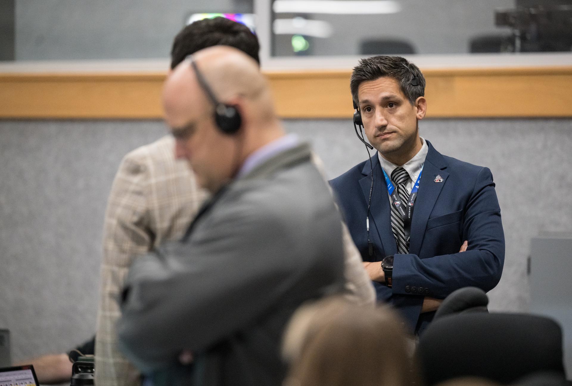 Members of the Artemis II launch team are seen on console in Firing Room One of the Rocco A. Petrone Launch Control Center as NASA’s Artemis II Space Launch System (SLS) rocket and Orion spacecraft, secured to the mobile launcher, roll out of High Bay 3 of the Vehicle Assembly Building to Launch Complex 39B, Saturday, Jan. 17, 2026, at NASA’s Kennedy Space Center in Florida. NASA’s Artemis II test flight will take Commander Reid Wiseman, Pilot Victor Glover, and Mission Specialist Christina Koch from NASA, and Mission Specialist Jeremy Hansen from the CSA (Canadian Space Agency), around the Moon and back to Earth no later than April 2026. Photo Credit: (NASA/Aubrey Gemignani)