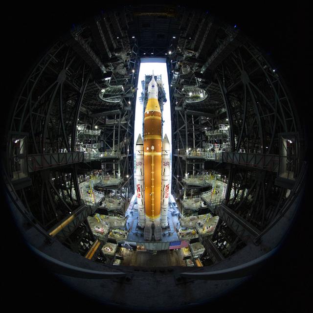 In this image made with a circular fisheye lens, NASA’s Space Launch System (...