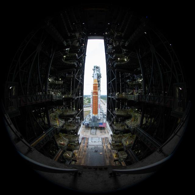 In this image made with a circular fisheye lens, NASA’s Space Launch System (...