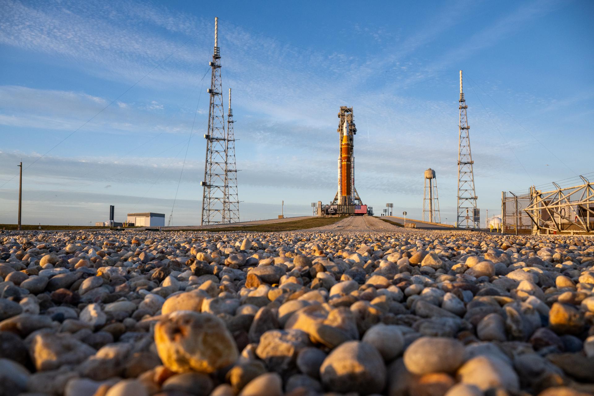 NASA’s Artemis II Space Launch System (SLS) rocket and Orion spacecraft are seen atop a mobile launcher at Launch Complex 39B, Saturday, Jan. 17, 2026, after being rolled out to the launch pad at NASA’s Kennedy Space Center in Florida. NASA’s Artemis II test flight will take Commander Reid Wiseman, Pilot Victor Glover, and Mission Specialist Christina Koch from NASA, and Mission Specialist Jeremy Hansen from the CSA (Canadian Space Agency), around the Moon and back to Earth no later than April 2026. Photo Credit: (NASA/Keegan Barber)