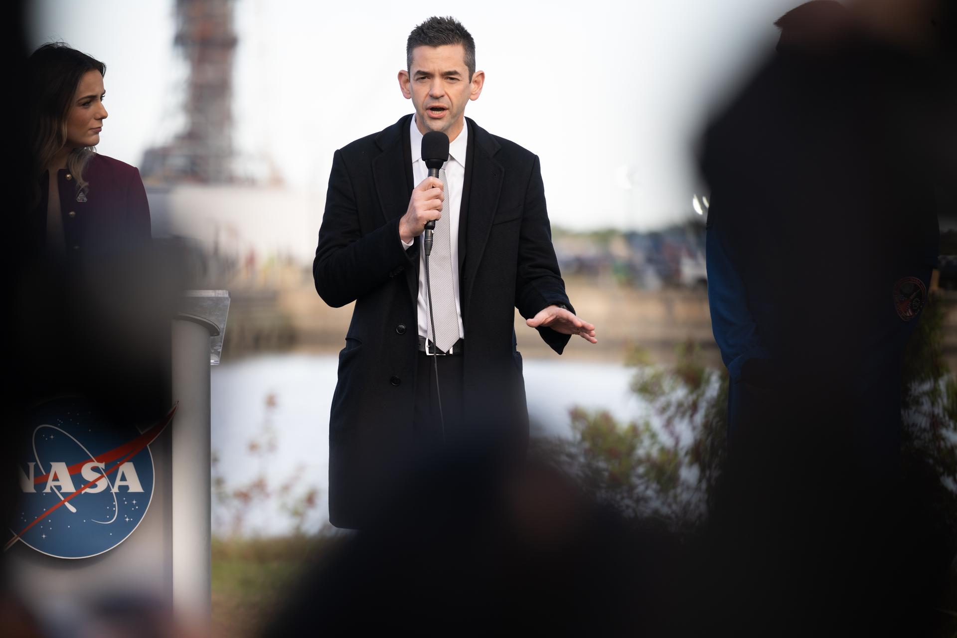 NASA Administrator Jared Isaacman speaks to members of the media during NASA’s Artemis II SLS (Space Launch System) rocket and Orion spacecraft rollout to Launch Complex 39B at NASA’s Kennedy Space Center in Florida on Saturday, Jan. 17, 2026. In the coming weeks, engineers will prepare for the wet dress rehearsal, a two-day test that simulates launch day. The Artemis II test flight will take Commander Reid Wiseman, Pilot Victor Glover, and Mission Specialist Christina Koch from NASA, and Mission Specialist Jeremy Hansen from the CSA (Canadian Space Agency), around the Moon and back to Earth no later than April 2026. Photo Credit: (NASA/Joel Kowsky)