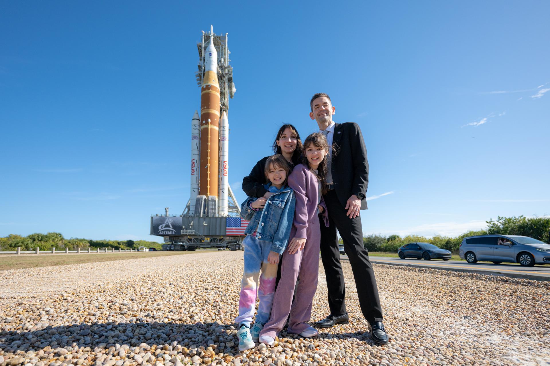 NASA Administrator Jared Isaacman, right, poses with members of his family as NASA’s Artemis II SLS (Space Launch System) rocket and Orion spacecraft roll out to Launch Complex 39B, Saturday, Jan. 17, 2026, at NASA’s Kennedy Space Center in Florida. Photo Credit: (NASA/John Kraus)