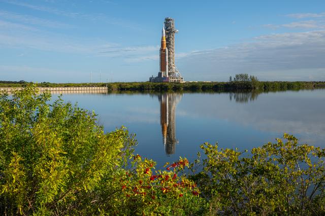 NASA’s Artemis II SLS (Space Launch System) rocket and Orion spacecraft roll ...
