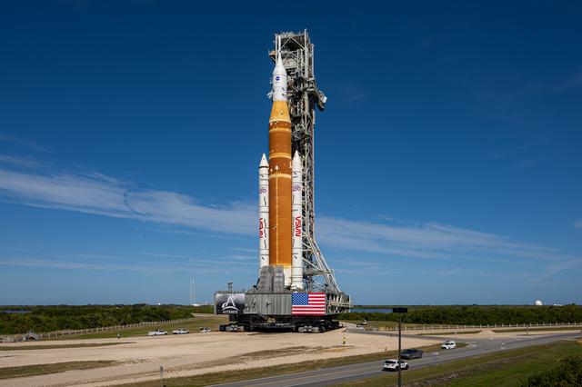 NASA’s Artemis II SLS (Space Launch System) rocket and Orion spacecraft roll ...