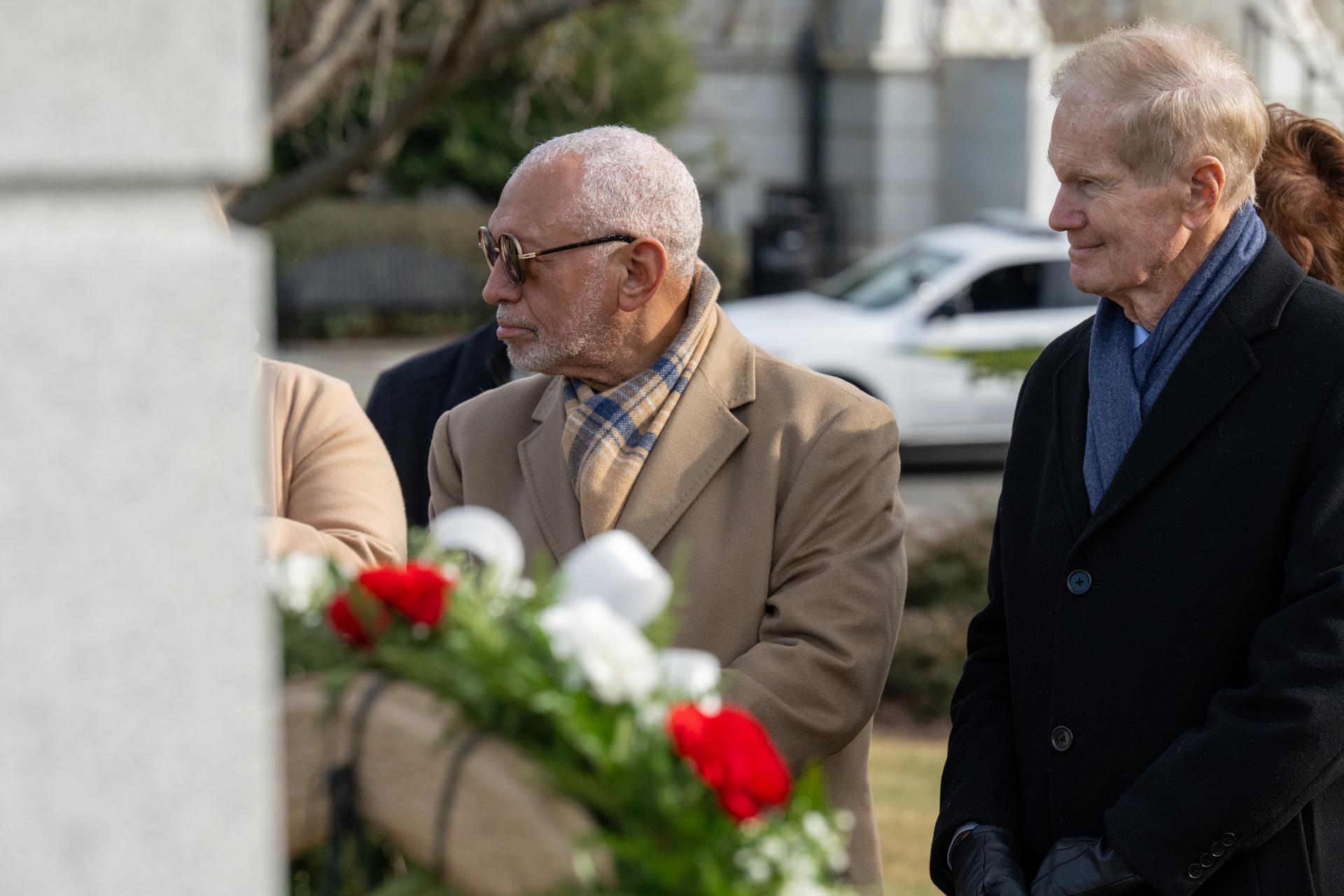 Former NASA Administrator Charles Bolden, left, and former NASA Administrator Bill Nelson, right, are seen during a wreath laying ceremony as part of NASA's Day of Remembrance, Thursday, Jan. 22, 2026, at Arlington National Cemetery in Arlington, Va. Wreaths were laid in memory of those men and women who lost their lives in the quest for space exploration. Photo Credit: (NASA/Keegan Barber)