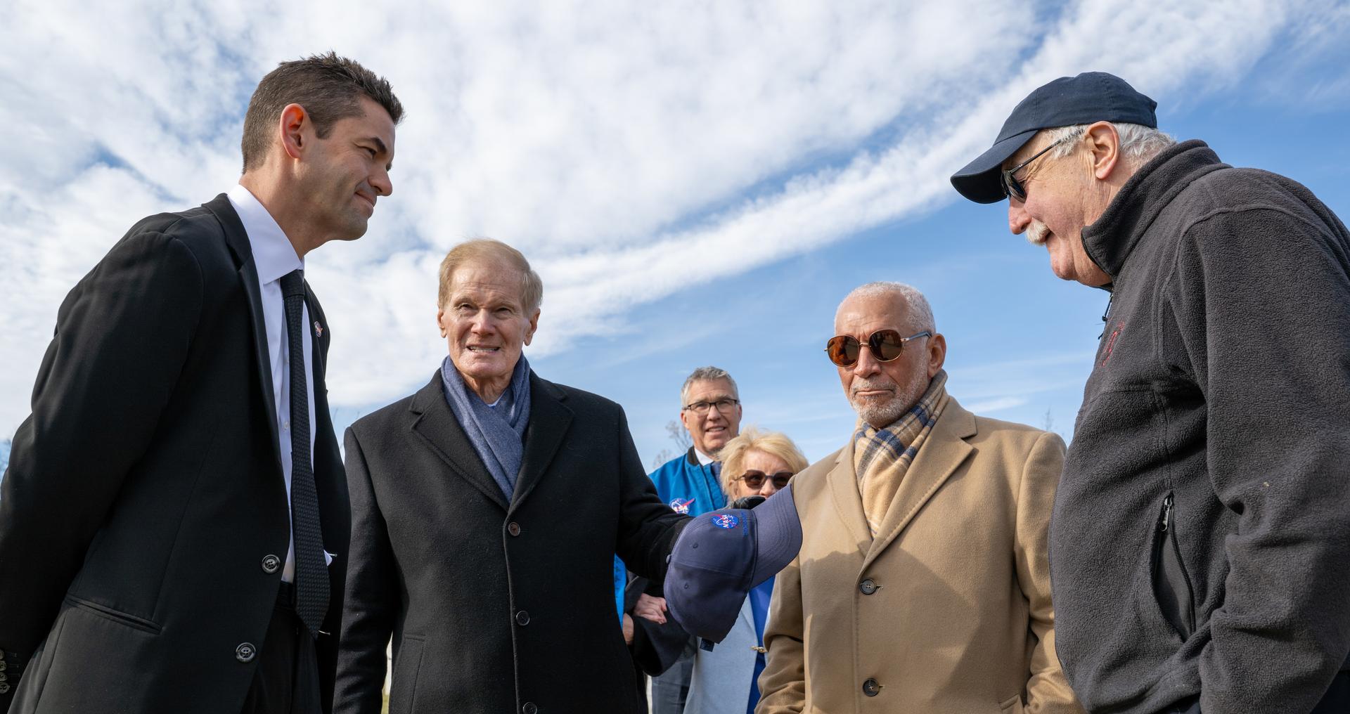 NASA Administrator Jared Isaacman, left, speaks with, second from left to right, former NASA Administrators Bill Nelson, Charles Bolden, and Sean O'Keefe following a wreath laying ceremony as part of NASA's Day of Remembrance, Thursday, Jan. 22, 2026, at Arlington National Cemetery in Arlington, Va. Wreaths were laid in memory of those men and women who lost their lives in the quest for space exploration. Photo Credit: (NASA/Keegan Barber)