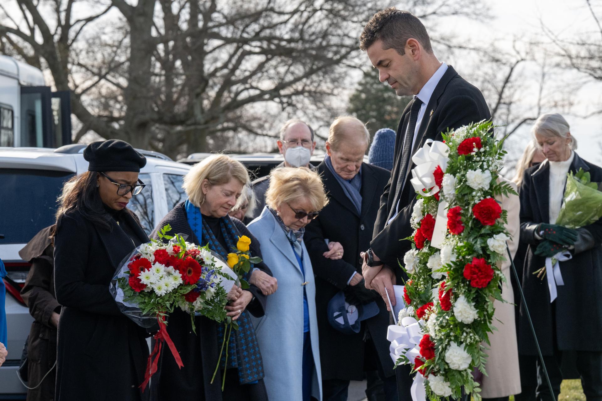 NASA leadership and guests are seen during a moment of silence led by NASA Administrator Jared Isaacman as part of NASA's Day of Remembrance, Thursday, Jan. 22, 2026, at Arlington National Cemetery in Arlington, Va. Wreaths were laid in memory of those men and women who lost their lives in the quest for space exploration. Photo Credit: (NASA/Keegan Barber)