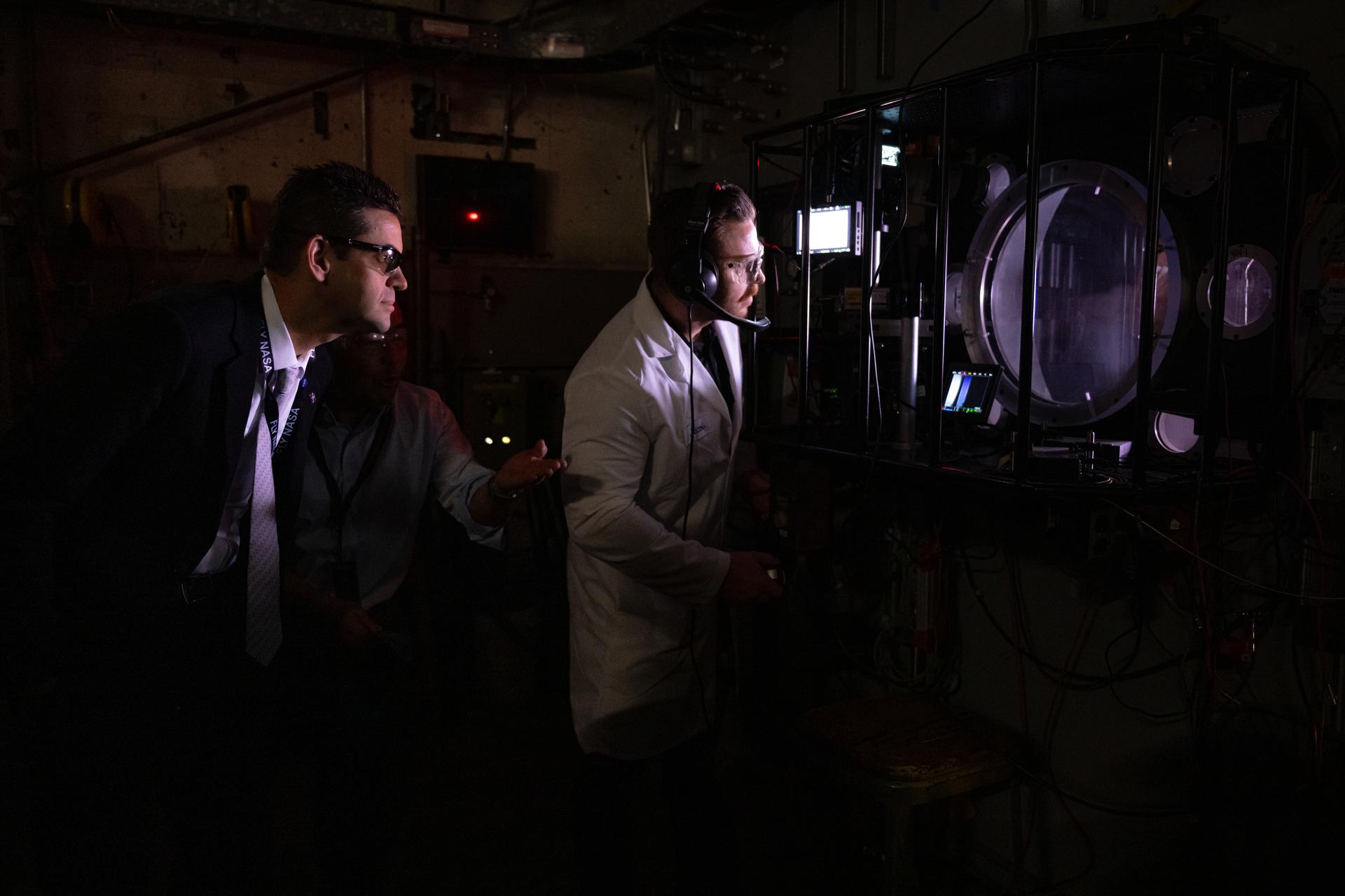 NASA Administrator Jared Isaacman, left, views an arc jet test, Monday, Jan. 26, 2026, at NASA’s Ames Research Center in Mountain View, Calif. Ames marks the tenth stop in Isaacman’s roadshow to visit NASA facilities and engage directly with the agency’s workforce. Photo Credit: (NASA/John Kraus)