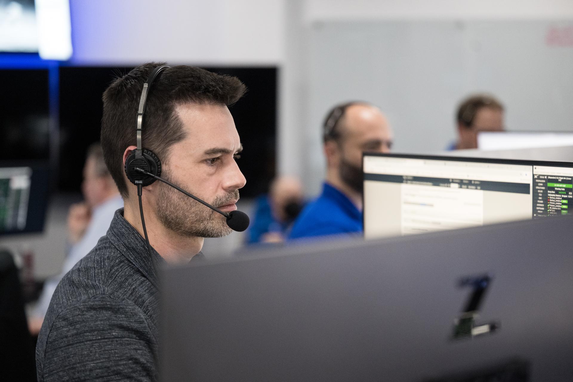 John Posey, lead engineer for Dragon in NASA's Commercial Crew Program, monitors the countdown during a dress rehearsal in preparation for the launch of a SpaceX Falcon 9 rocket carrying the company's Dragon spacecraft on NASA’s SpaceX Crew-12 mission with NASA astronauts Jessica Meir, Jack Hathaway, ESA (European Space Agency) astronaut Sophie Adenot, and Roscosmos cosmonaut Andrey Fedyaev onboard, Monday, Feb. 9, 2026, in the control room of SpaceX’s HangarX at NASA’s Kennedy Space Center in Florida. NASA’s SpaceX Crew-12 mission is the twelfth crew rotation mission of the SpaceX Dragon spacecraft and Falcon 9 rocket to the International Space Station as part of the agency’s Commercial Crew Program. Meir, Hathaway, Adenot, and Fedyaev will launch from Space Launch Complex 40 at the Cape Canaveral Space Force Station. Photo Credit: (NASA/Aubrey Gemignani)
