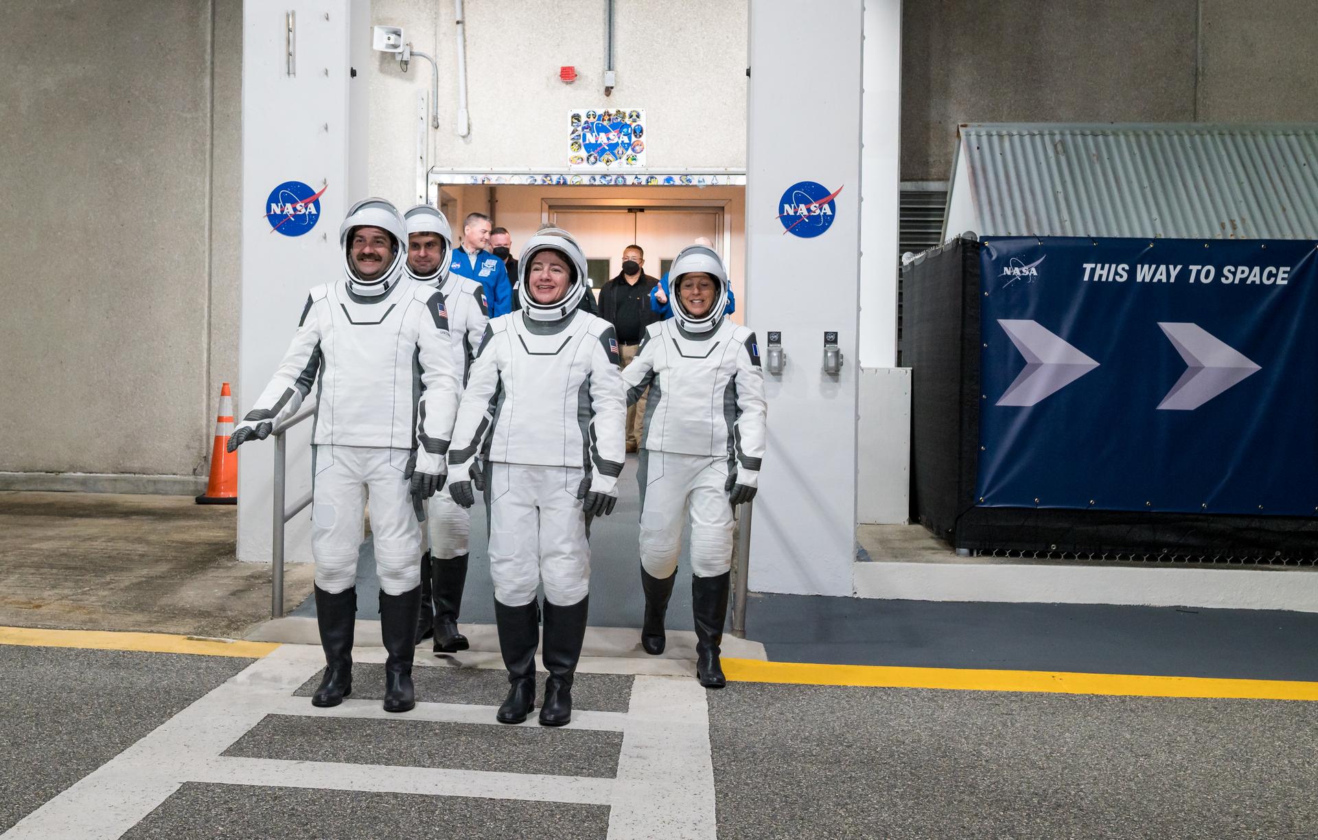 NASA astronauts Jack Hathaway, left front, Jessica Meir, right front, ESA (European Space Agency) astronaut Sophie Adenot, back right, and Roscosmos cosmonaut Andrey Fedyaev, wearing SpaceX spacesuits, are seen as they prepare to depart the Neil  A. Armstrong Operations and Checkout Building for Space Launch Complex 40 on Cape Canaveral Space Force Station during a dress rehearsal prior to the Crew-12 mission launch, Monday, Feb. 9, 2026, at NASA’s Kennedy Space Center in Florida. NASA’s SpaceX Crew-12 mission is the twelfth crew rotation mission of the SpaceX Dragon spacecraft and Falcon 9 rocket to the International Space Station as part of the agency’s Commercial Crew Program. Meir, Hathaway, Adenot, and Fedyaev are scheduled to launch at 5:15 a.m. EST on Friday, Feb. 13, 2026, from Space Launch Complex 40 at the Cape Canaveral Space Force Station. Photo Credit: (NASA/Aubrey Gemignani)