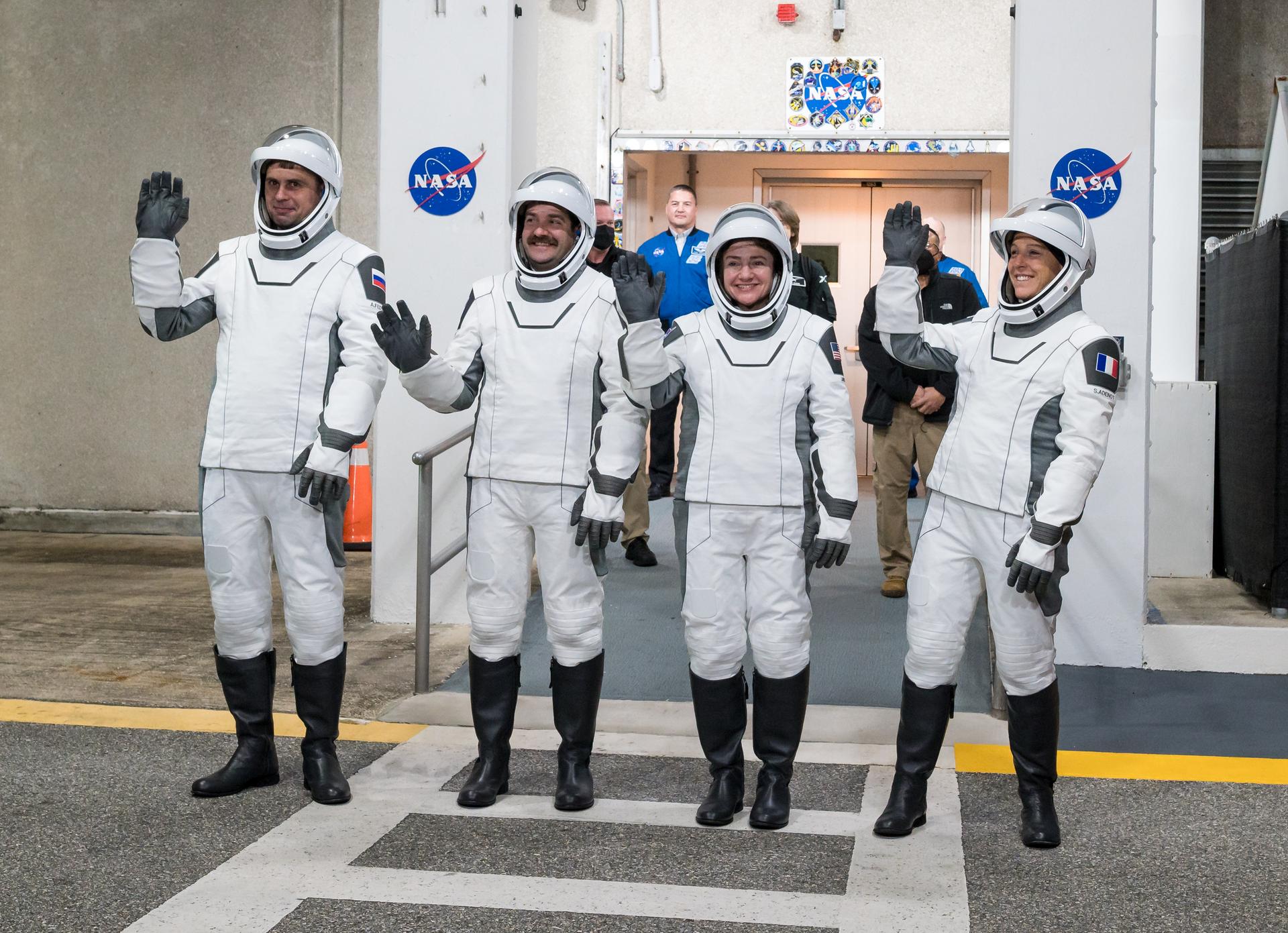 NASA astronauts Jack Hathaway, middle left, Jessica Meir, middle right, Roscosmos cosmonaut Andrey Fedyaev, left, and ESA (European Space Agency) astronaut Sophie Adenot, right, wearing SpaceX spacesuits, are seen as they prepare to depart the Neil  A. Armstrong Operations and Checkout Building for Space Launch Complex 40 on Cape Canaveral Space Force Station during a dress rehearsal prior to the Crew-12 mission launch, Monday, Feb. 9, 2026, at NASA’s Kennedy Space Center in Florida. NASA’s SpaceX Crew-12 mission is the twelfth crew rotation mission of the SpaceX Dragon spacecraft and Falcon 9 rocket to the International Space Station as part of the agency’s Commercial Crew Program. Meir, Hathaway, Adenot, and Fedyaev are scheduled to launch at 5:15 a.m. EST on Friday, Feb. 13, 2026, from Space Launch Complex 40 at the Cape Canaveral Space Force Station. Photo Credit: (NASA/Aubrey Gemignani)