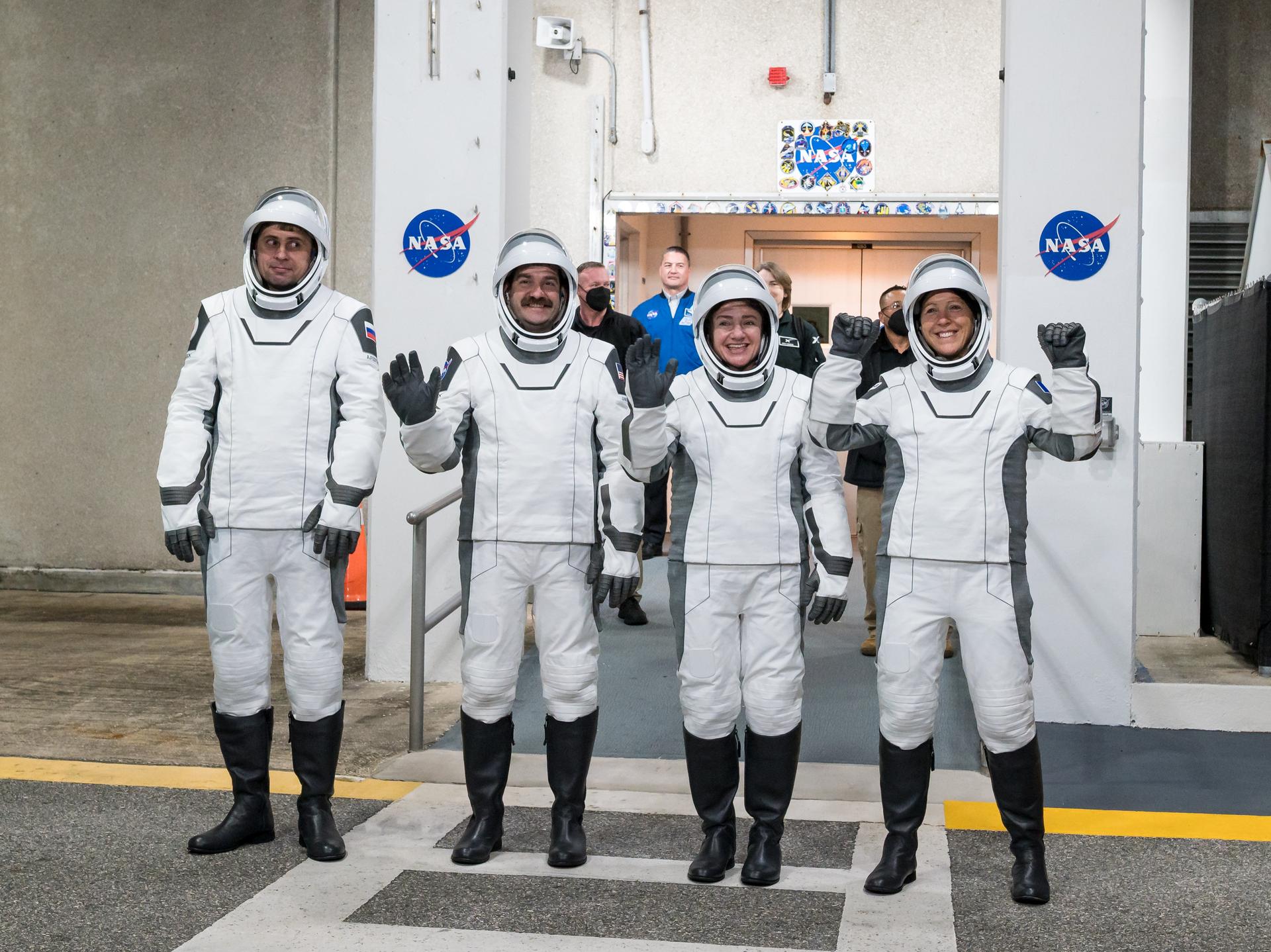 NASA astronauts Jack Hathaway, middle left, Jessica Meir, middle right, Roscosmos cosmonaut Andrey Fedyaev, left, and ESA (European Space Agency) astronaut Sophie Adenot, right, wearing SpaceX spacesuits, are seen as they prepare to depart the Neil  A. Armstrong Operations and Checkout Building for Space Launch Complex 40 on Cape Canaveral Space Force Station during a dress rehearsal prior to the Crew-12 mission launch, Monday, Feb. 9, 2026, at NASA’s Kennedy Space Center in Florida. NASA’s SpaceX Crew-12 mission is the twelfth crew rotation mission of the SpaceX Dragon spacecraft and Falcon 9 rocket to the International Space Station as part of the agency’s Commercial Crew Program. Meir, Hathaway, Adenot, and Fedyaev are scheduled to launch at 5:15 a.m. EST on Friday, Feb. 13, 2026, from Space Launch Complex 40 at the Cape Canaveral Space Force Station. Photo Credit: (NASA/Aubrey Gemignani)