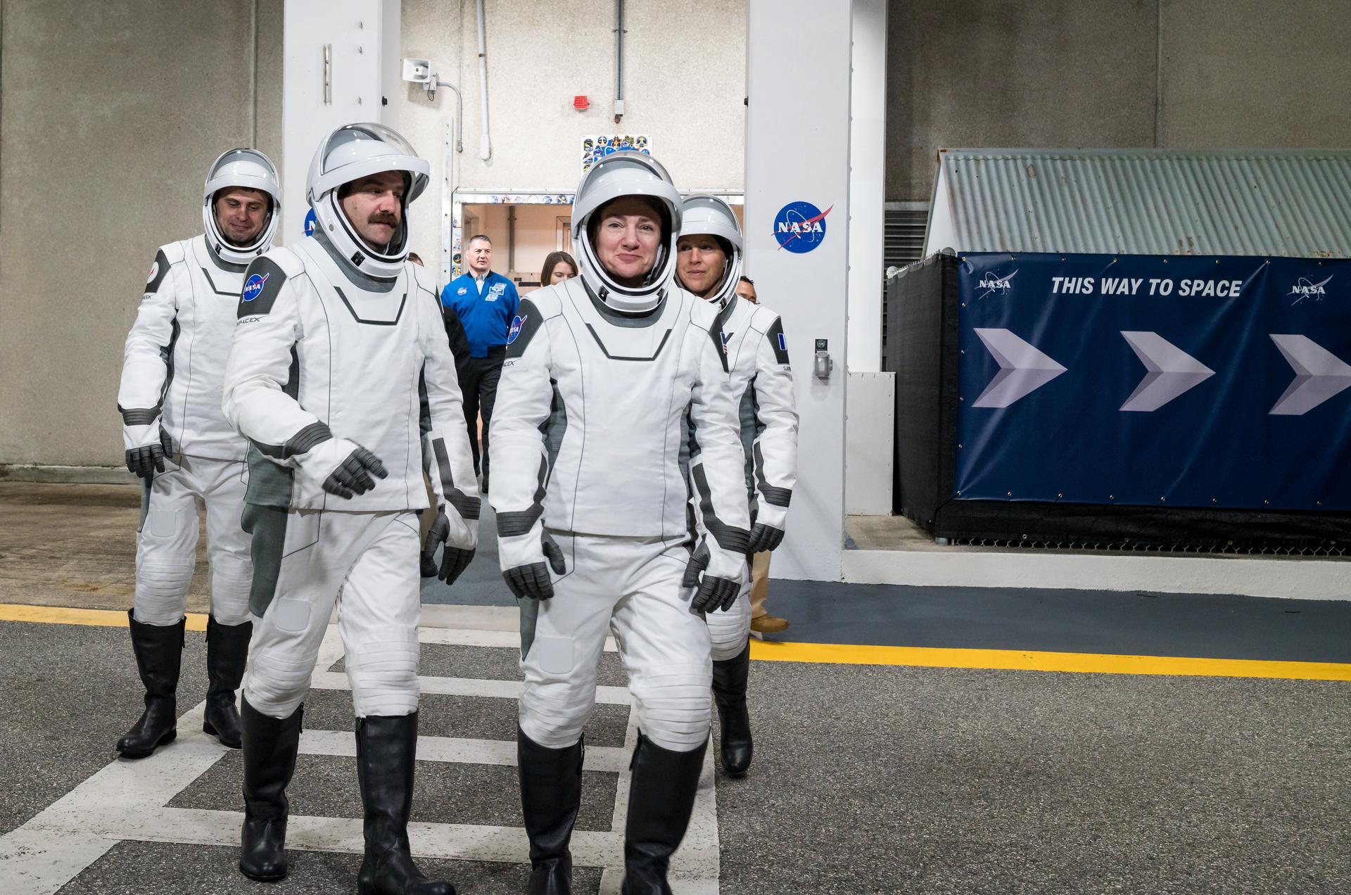NASA astronauts Jack Hathaway, left front, Jessica Meir, right front, ESA (European Space Agency) astronaut Sophie Adenot, back right, and Roscosmos cosmonaut Andrey Fedyaev, wearing SpaceX spacesuits, are seen as they prepare to depart the Neil  A. Armstrong Operations and Checkout Building for Space Launch Complex 40 on Cape Canaveral Space Force Station during a dress rehearsal prior to the Crew-12 mission launch, Monday, Feb. 9, 2026, at NASA’s Kennedy Space Center in Florida. NASA’s SpaceX Crew-12 mission is the twelfth crew rotation mission of the SpaceX Dragon spacecraft and Falcon 9 rocket to the International Space Station as part of the agency’s Commercial Crew Program. Meir, Hathaway, Adenot, and Fedyaev are scheduled to launch at 5:15 a.m. EST on Friday, Feb. 13, 2026, from Space Launch Complex 40 at the Cape Canaveral Space Force Station. Photo Credit: (NASA/Aubrey Gemignani)