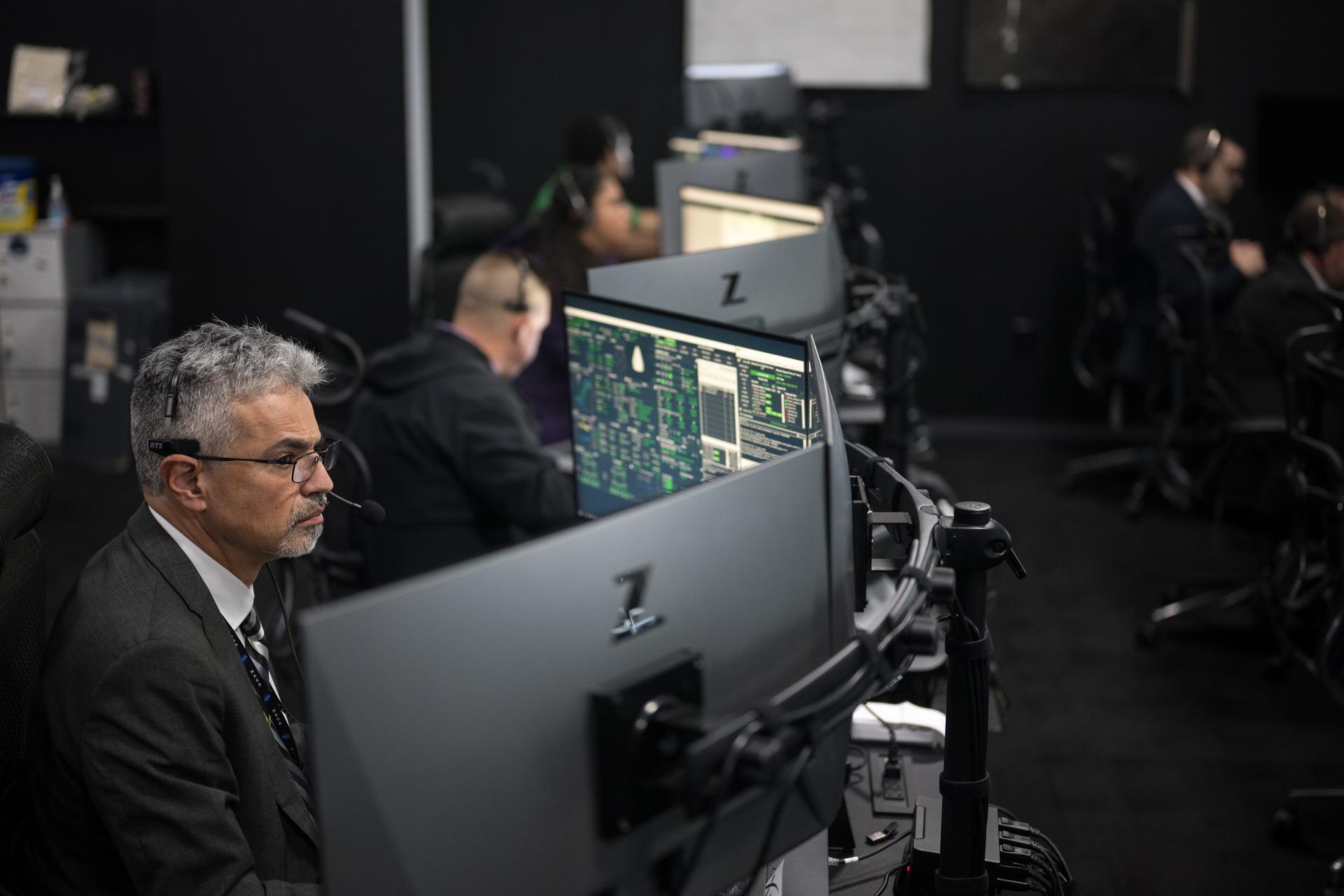 Mission teams monitor the countdown of the launch of a SpaceX Falcon 9 rocket carrying the company's Dragon spacecraft on NASA’s SpaceX Crew-12 mission with NASA astronauts Jessica Meir, Jack Hathaway, ESA (European Space Agency) astronaut Sophie Adenot, and Roscosmos cosmonaut Andrey Fedyaev onboard, Friday, Feb. 13, 2026, in the control center of SpaceX’s HangarX at NASA’s Kennedy Space Center in Florida. NASA’s SpaceX Crew-12 mission is the twelfth crew rotation mission of the SpaceX Dragon spacecraft and Falcon 9 rocket to the International Space Station as part of the agency’s Commercial Crew Program. Meir, Hathaway, Adenot, and Fedyaev are scheduled to launch at 5:15 a.m. EST, from Space Launch Complex 40 at the Cape Canaveral Space Force Station. Photo Credit: (NASA/Aubrey Gemignani)
