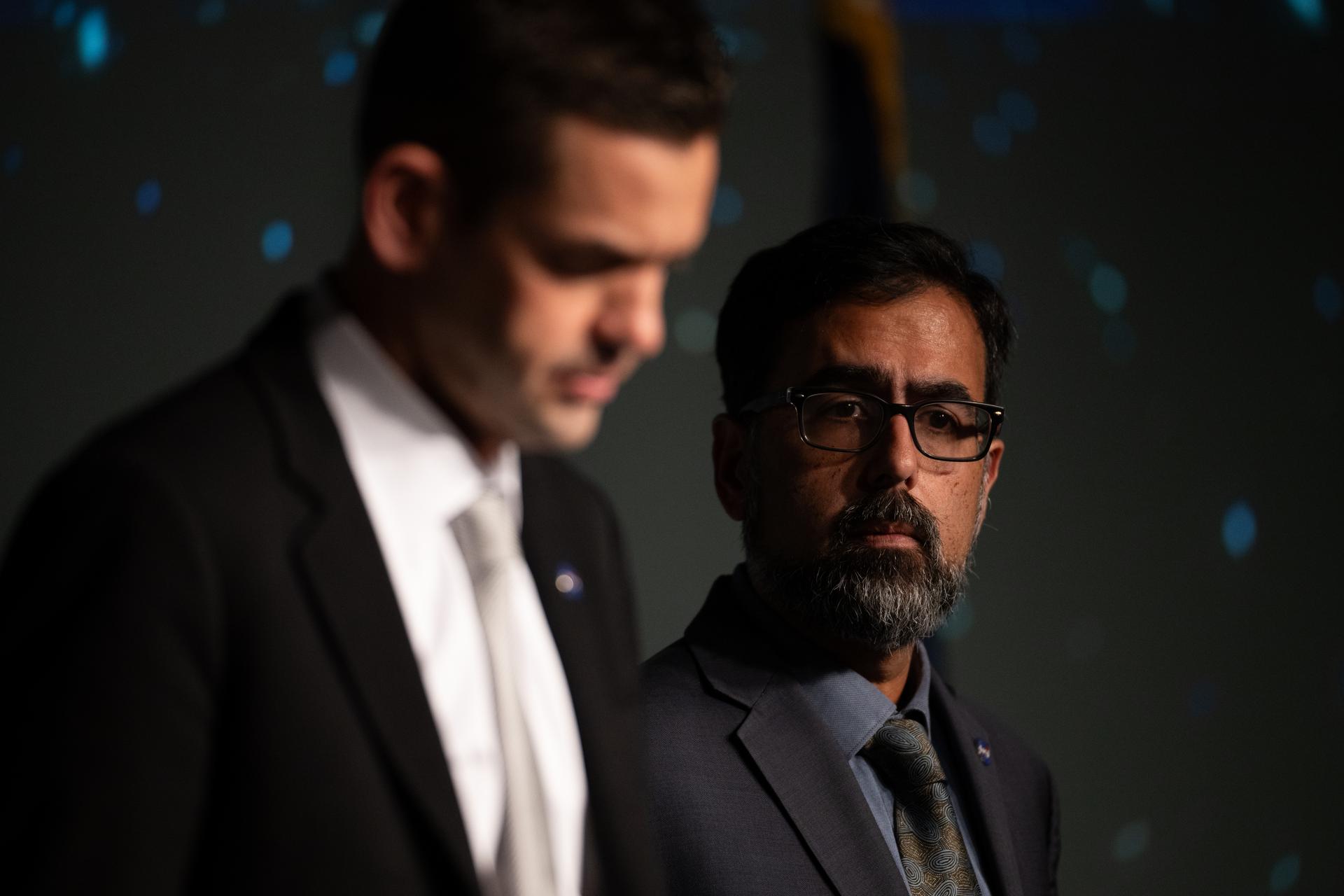 NASA Associate Administrator Amit Kshatriya looks on as NASA Administrator Jared Isaacman discusses a report of findings examining the Boeing CST-100 Starliner Crewed Flight Test, Thursday, Feb. 19, 2026, at the Mary W. Jackson NASA Headquarters building in Washington. Photo Credit: (NASA/Joel Kowsky)