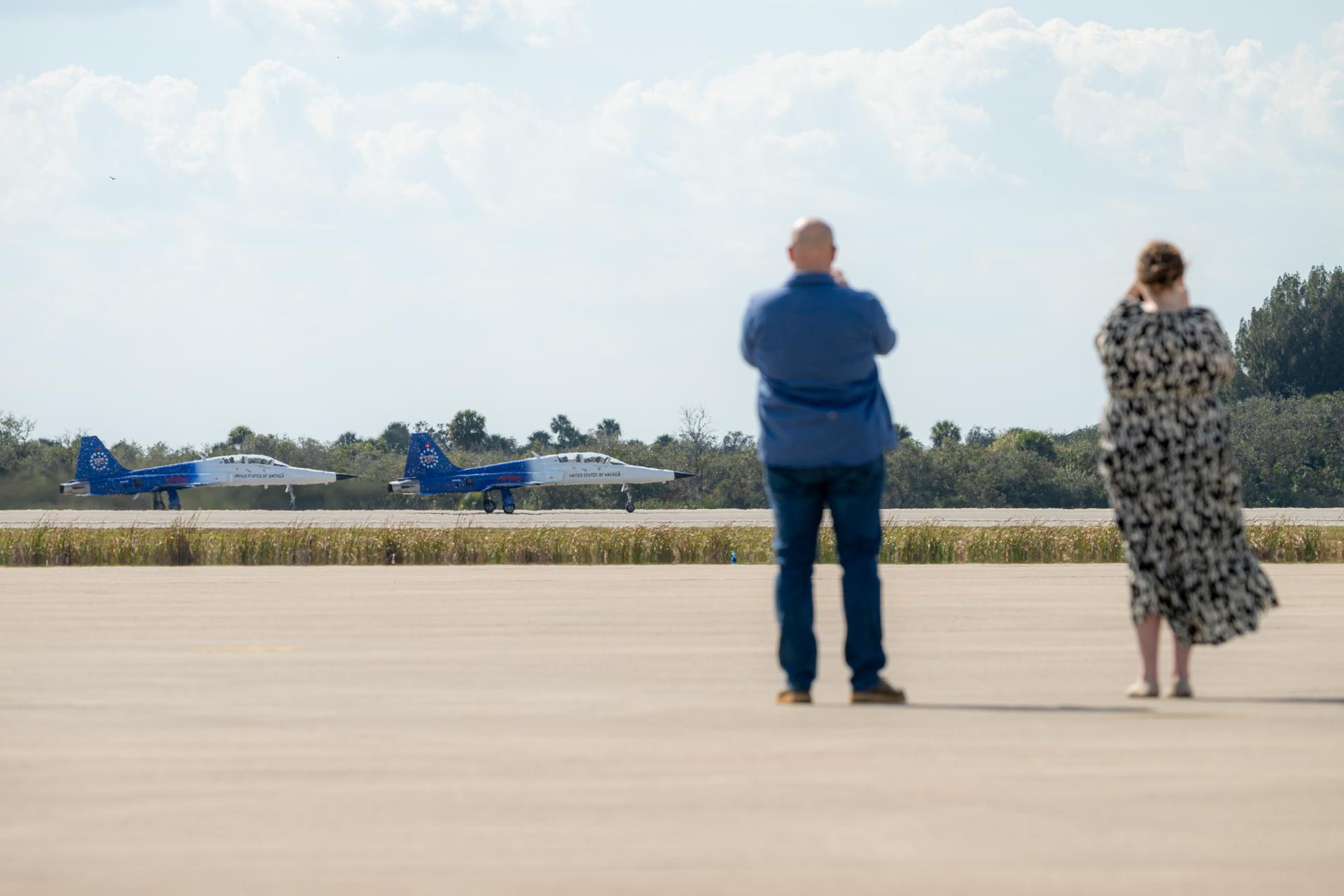 Family members of NASA employees watch as members of the NASA workforce participate in an employee incentive flying event with NASA Administrator Jared Isaacman's personal F-5 aircraft, Friday, Feb. 20, 2026, at NASA’s Kennedy Space Center in Florida. Photo Credit: (NASA/John Kraus)