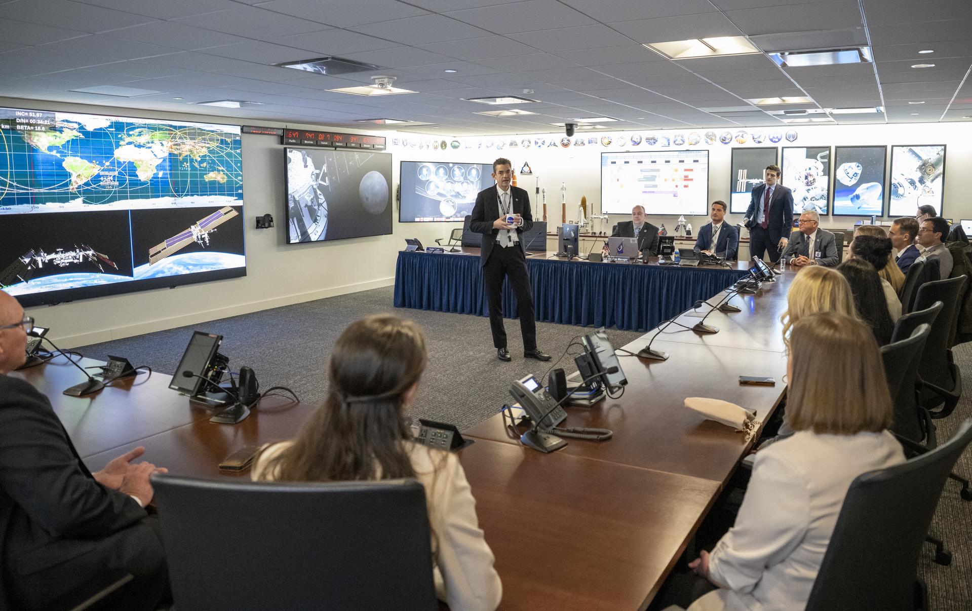 NASA Administrator Jared Isaacman speaks with Embry‑Riddle Aeronautical University students and staff in the Space Operations Center (SOC), Thursday, March 19, 2026, at the Mary W. Jackson NASA Headquarters building in Washington. The group is visiting NASA Headquarters after six Embry‑Riddle Aeronautical University students were named to the Aviation Week Network 20 Twenties Class of 2026, which recognizes outstanding aerospace-focused university students. Photo Credit: (NASA/Keegan Barber)
