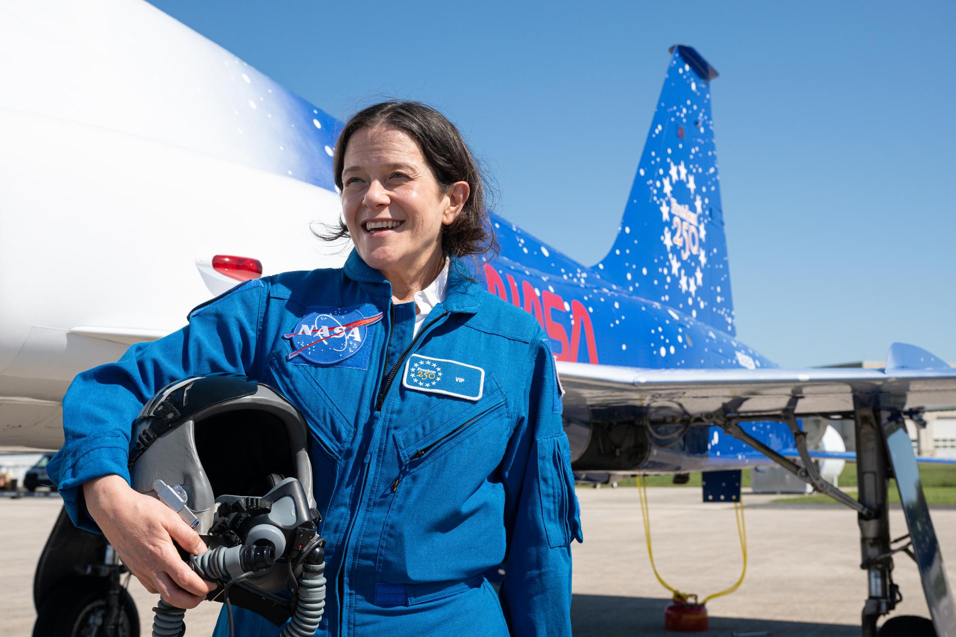Teresa Nieves-Chinchilla, director of the Moon to Mars Space Weather Analysis Office at NASA’s Goddard Space Flight Center, poses for a photograph before an employee incentive flying event with NASA Administrator Jared Isaacman's personal F-5 aircraft, Friday, March 27, 2026, at NASA’s Kennedy Space Center in Florida. Photo Credit: (NASA/John Kraus)
