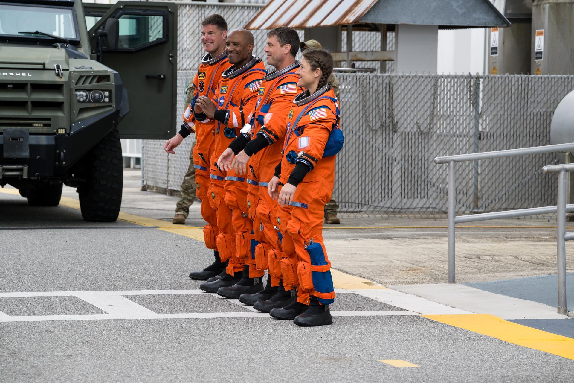 From right to left, NASA astronauts Christina Koch, mission specialist; Reid Wiseman, commander; Victor Glover, pilot; and CSA (Canadian Space Agency) astronaut Jeremy Hansen, mission specialist are seen as they depart the Neil A. Armstrong Operations and Checkout Building to board their Orion spacecraft atop NASA’s Space Launch System (SLS) rocket at Launch Complex 39B, Wednesday, April 1, 2026, at NASA’s Kennedy Space Center in Florida. NASA’s Artemis II mission will take Wiseman, Glover, Koch, and Hansen on a 10-day journey around the Moon and back aboard their Orion spacecraft from Launch Complex 39B,  with a two hour launch window opening at 6:24pm. Photo Credit: (NASA/Aubrey Gemignani)