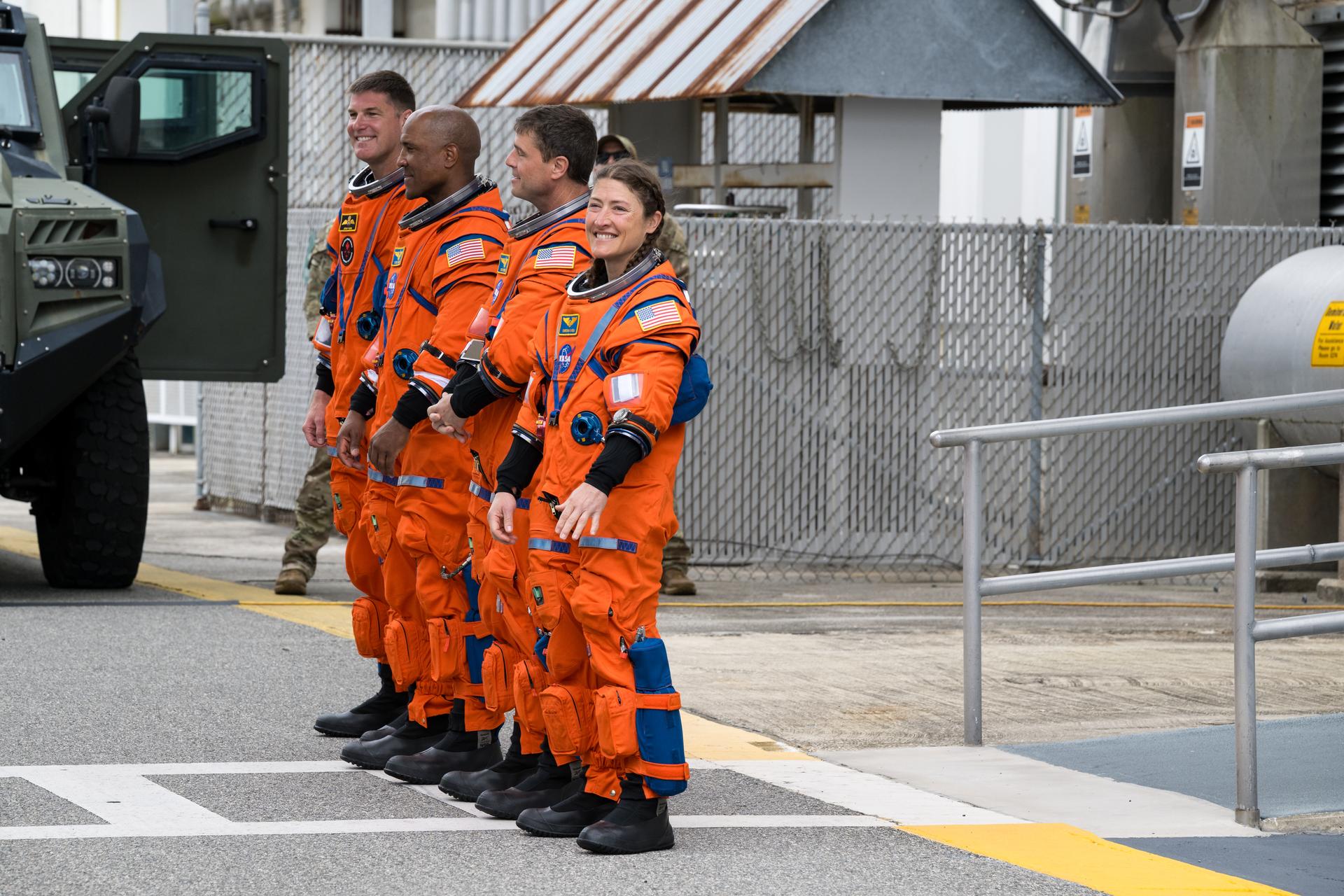 From right to left, NASA astronauts Christina Koch, mission specialist; Reid Wiseman, commander; Victor Glover, pilot; and CSA (Canadian Space Agency) astronaut Jeremy Hansen, mission specialist are seen as they depart the Neil A. Armstrong Operations and Checkout Building to board their Orion spacecraft atop NASA’s Space Launch System (SLS) rocket at Launch Complex 39B, Wednesday, April 1, 2026, at NASA’s Kennedy Space Center in Florida. NASA’s Artemis II mission will take Wiseman, Glover, Koch, and Hansen on a 10-day journey around the Moon and back aboard their Orion spacecraft from Launch Complex 39B,  with a two hour launch window opening at 6:24pm. Photo Credit: (NASA/Aubrey Gemignani)
