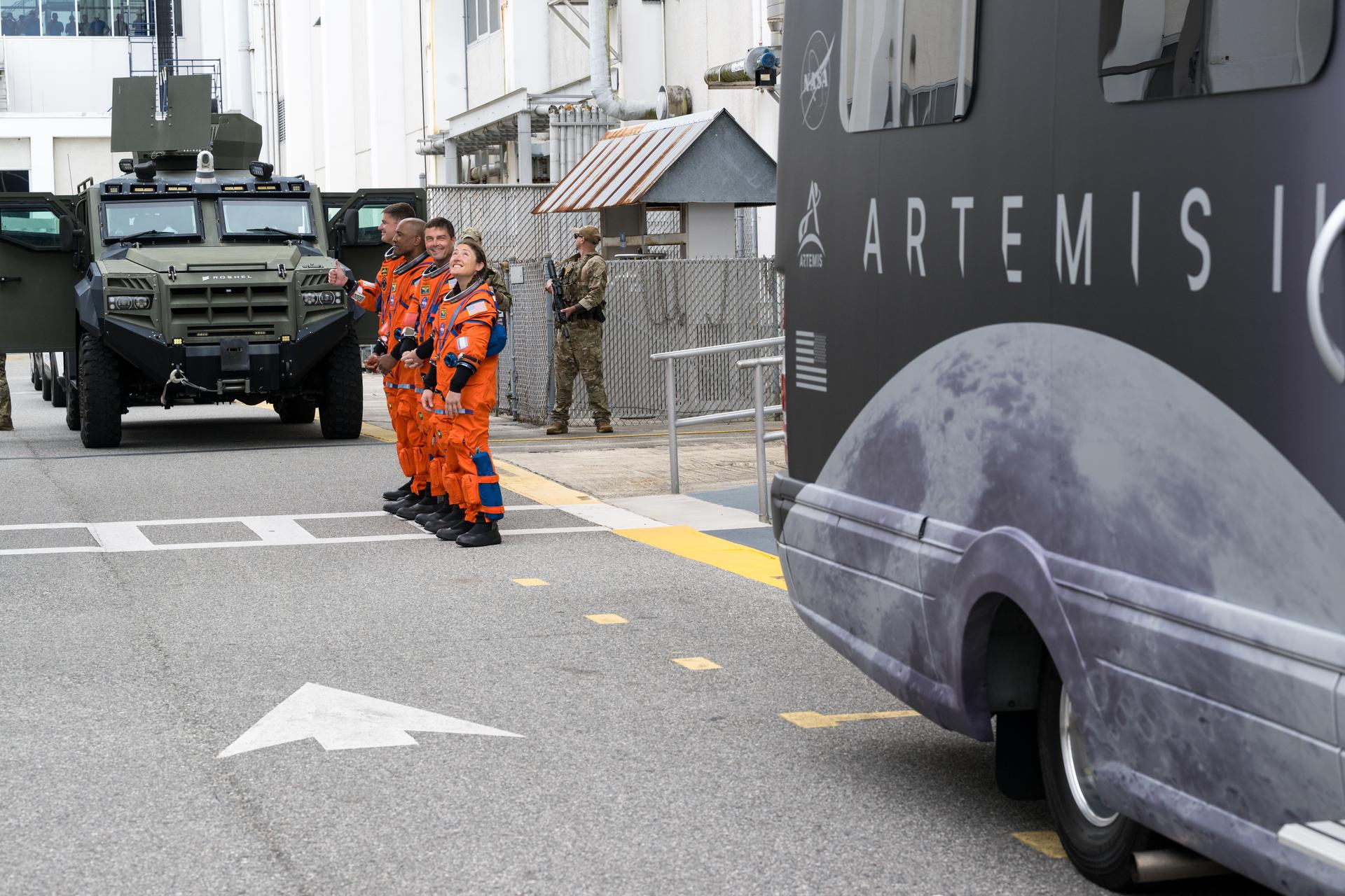 From right to left, NASA astronauts Christina Koch, mission specialist; Reid Wiseman, commander; Victor Glover, pilot; and CSA (Canadian Space Agency) astronaut Jeremy Hansen, mission specialist are seen as they depart the Neil A. Armstrong Operations and Checkout Building to board their Orion spacecraft atop NASA’s Space Launch System (SLS) rocket at Launch Complex 39B, Wednesday, April 1, 2026, at NASA’s Kennedy Space Center in Florida. NASA’s Artemis II mission will take Wiseman, Glover, Koch, and Hansen on a 10-day journey around the Moon and back aboard their Orion spacecraft from Launch Complex 39B,  with a two hour launch window opening at 6:24pm. Photo Credit: (NASA/Aubrey Gemignani)