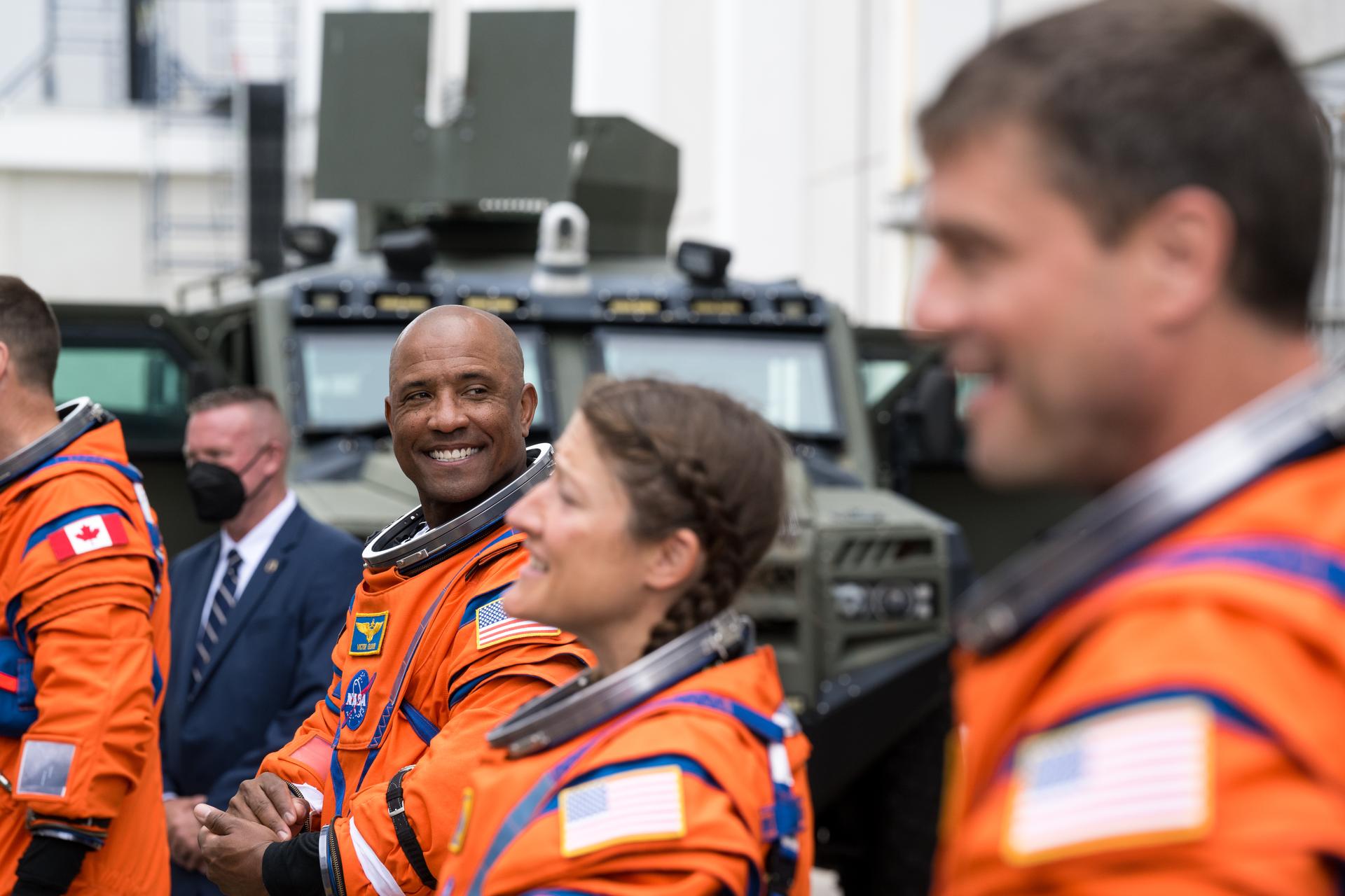 From right to left, NASA astronauts Reid Wiseman, commander; Christina Koch, mission specialist; Victor Glover, pilot; and CSA (Canadian Space Agency) astronaut Jeremy Hansen, mission specialist (not pictured) are seen as they depart the Neil A. Armstrong Operations and Checkout Building to board their Orion spacecraft atop NASA’s Space Launch System (SLS) rocket at Launch Complex 39B, Wednesday, April 1, 2026, at NASA’s Kennedy Space Center in Florida. NASA’s Artemis II mission will take Wiseman, Glover, Koch, and Hansen on a 10-day journey around the Moon and back aboard their Orion spacecraft from Launch Complex 39B,  with a two hour launch window opening at 6:24pm. Photo Credit: (NASA/Aubrey Gemignani)
