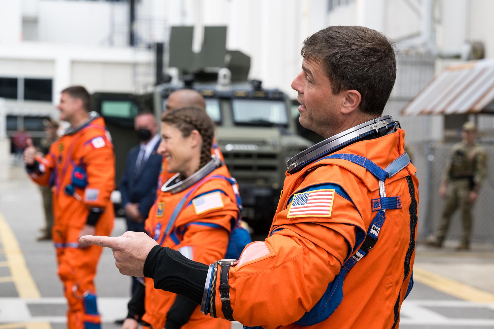 From right to left, NASA astronauts Reid Wiseman, commander; Christina Koch, mission specialist; Victor Glover, pilot; and CSA (Canadian Space Agency) astronaut Jeremy Hansen, mission specialist (not pictured) are seen as they depart the Neil A. Armstrong Operations and Checkout Building to board their Orion spacecraft atop NASA’s Space Launch System (SLS) rocket at Launch Complex 39B, Wednesday, April 1, 2026, at NASA’s Kennedy Space Center in Florida. NASA’s Artemis II mission will take Wiseman, Glover, Koch, and Hansen on a 10-day journey around the Moon and back aboard their Orion spacecraft from Launch Complex 39B,  with a two hour launch window opening at 6:24pm. Photo Credit: (NASA/Aubrey Gemignani)