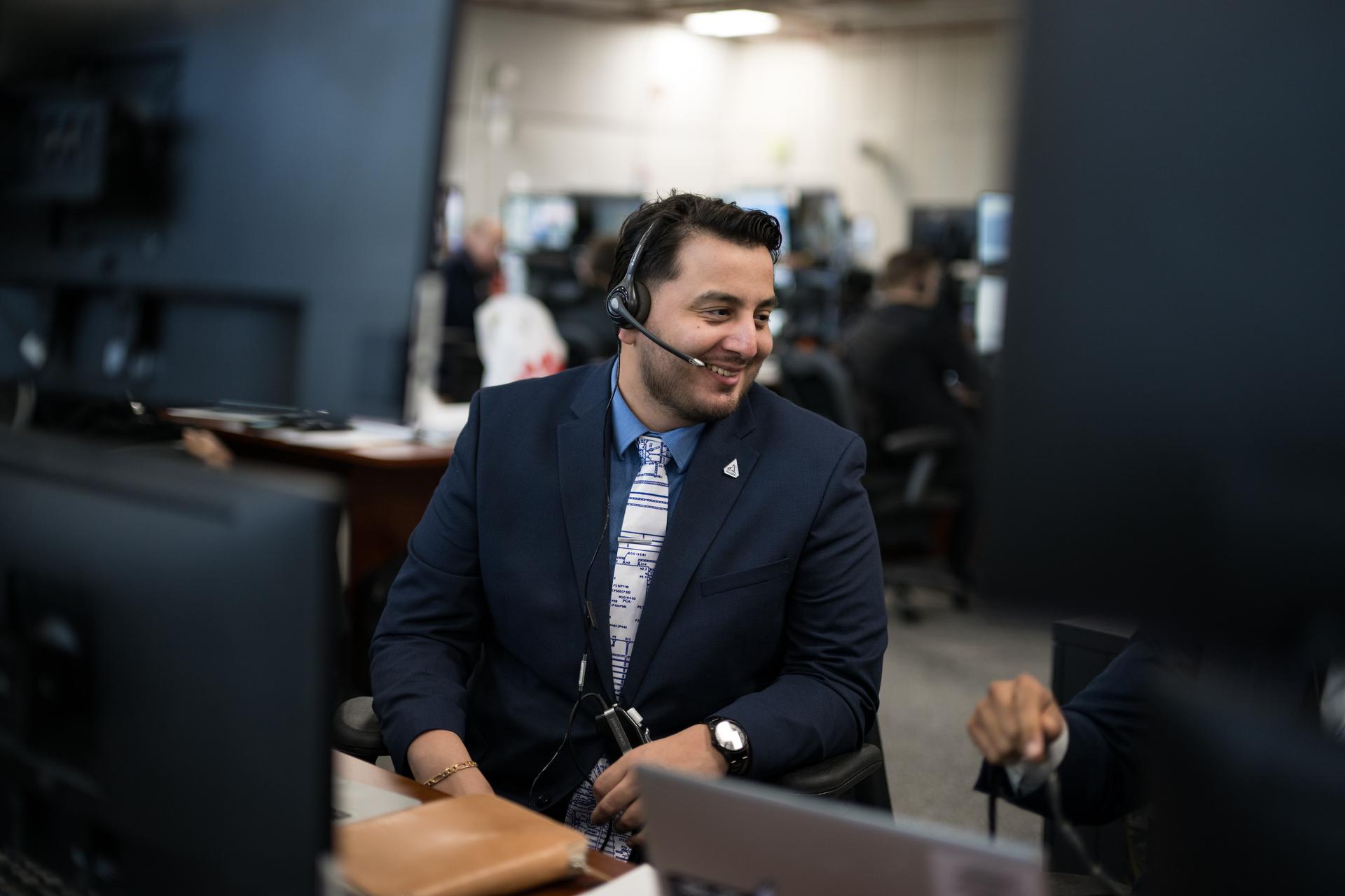 Teams monitor the countdown of the launch of NASA’s Space Launch System (SLS) rocket and Orion spacecraft with NASA astronauts Reid Wiseman, commander; Victor Glover, pilot; Christina Koch, mission specialist; and CSA (Canadian Space Agency) astronaut Jeremy Hansen, mission specialist onboard on the Artemis II mission from Firing Room 2 of the Rocco A. Petrone Launch Control Center, Wednesday, April 1, 2026, at NASA’s Kennedy Space Center in Florida. NASA’s Artemis II mission will take Wiseman, Glover, Koch, and Hansen on a 10-day journey around the Moon and back aboard SLS rocket and Orion spacecraft from Launch Complex 39B. The quartet launched at 6:35pm EDT. Photo Credit: (NASA/Aubrey Gemignani)