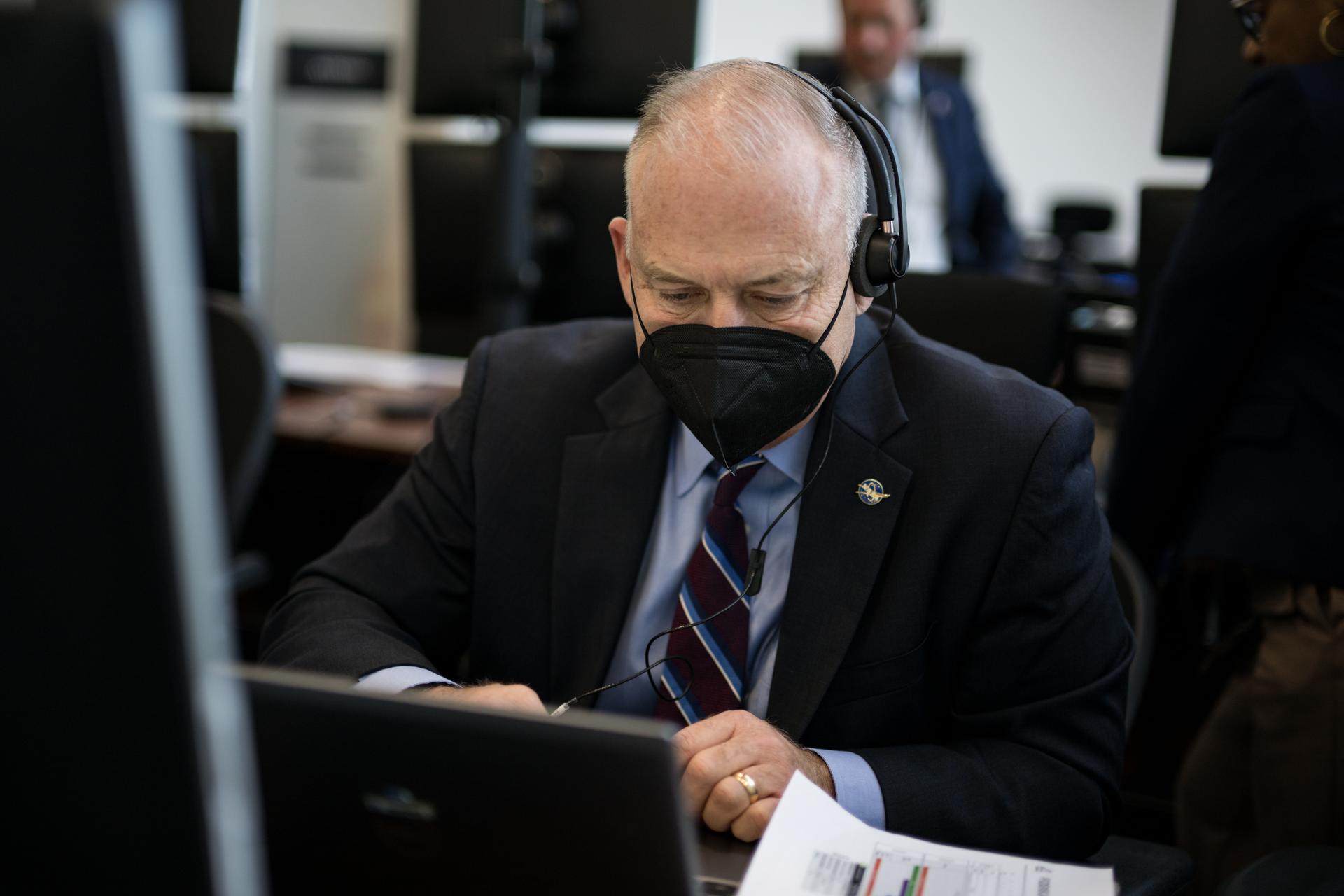 Director of Flight Operations at NASA's Johnson Space Center, Norm Knight, monitors the countdown of the launch of NASA’s Space Launch System (SLS) rocket and Orion spacecraft with NASA astronauts Reid Wiseman, commander; Victor Glover, pilot; Christina Koch, mission specialist; and CSA (Canadian Space Agency) astronaut Jeremy Hansen, mission specialist onboard on the Artemis II mission from Firing Room 2 of the Rocco A. Petrone Launch Control Center, Wednesday, April 1, 2026, at NASA’s Kennedy Space Center in Florida. NASA’s Artemis II mission will take Wiseman, Glover, Koch, and Hansen on a 10-day journey around the Moon and back aboard SLS rocket and Orion spacecraft from Launch Complex 39B. The quartet launched at 6:35pm EDT. Photo Credit: (NASA/Aubrey Gemignani)