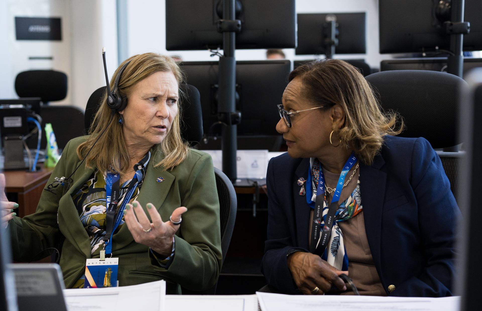 Director of NASA's Kennedy Space Center, Janet Petro, left, and Director of NASA's Johnson Space Center, Vanessa Wyche, monitor the countdown of the launch of NASA’s Space Launch System (SLS) rocket and Orion spacecraft with NASA astronauts Reid Wiseman, commander; Victor Glover, pilot; Christina Koch, mission specialist; and CSA (Canadian Space Agency) astronaut Jeremy Hansen, mission specialist onboard on the Artemis II mission from Firing Room 2 of the Rocco A. Petrone Launch Control Center, Wednesday, April 1, 2026, at NASA’s Kennedy Space Center in Florida. NASA’s Artemis II mission will take Wiseman, Glover, Koch, and Hansen on a 10-day journey around the Moon and back aboard SLS rocket and Orion spacecraft from Launch Complex 39B. The quartet launched at 6:35pm EDT. Photo Credit: (NASA/Aubrey Gemignani)