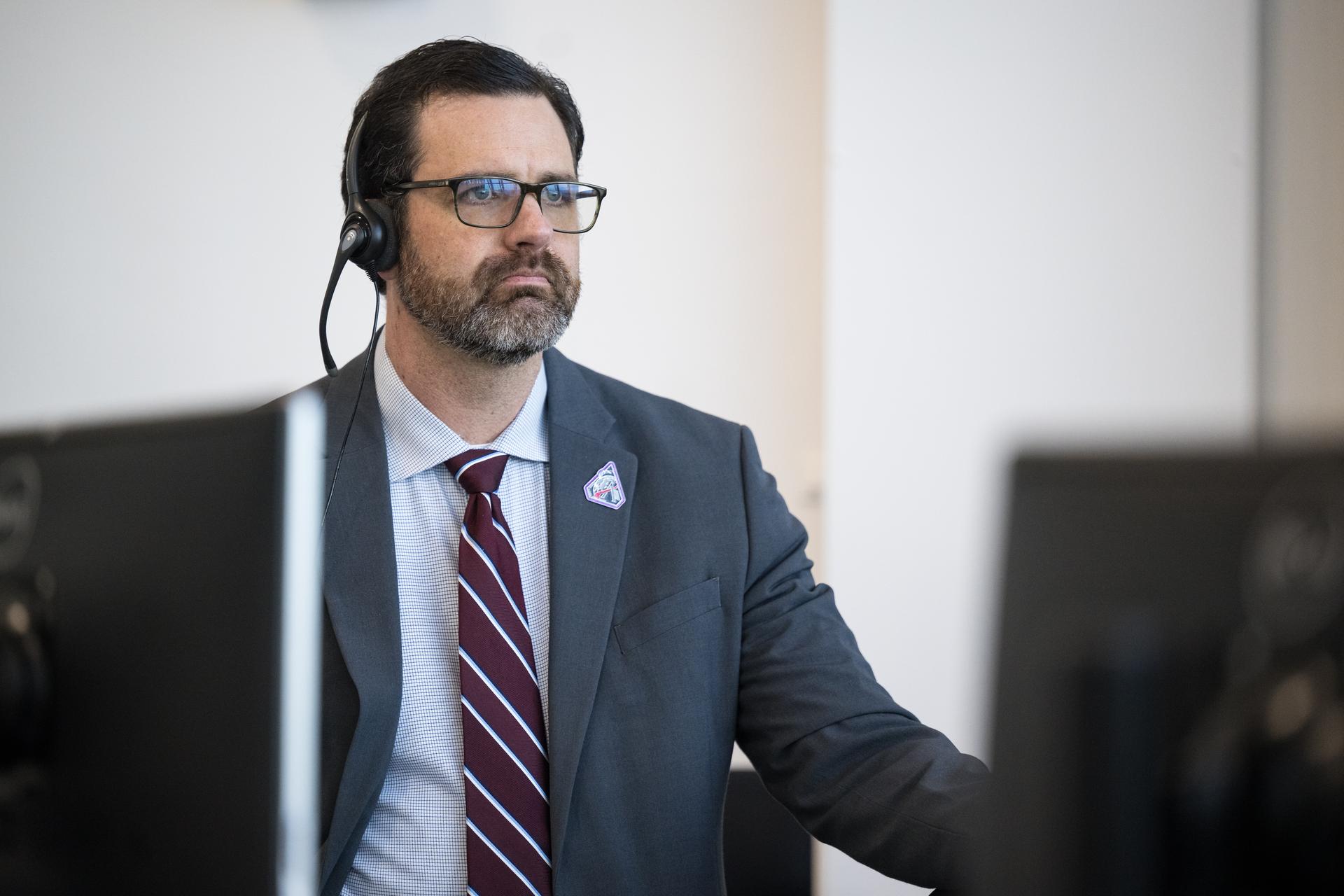 NASA Acting Deputy Associate Administrator for Moon to Mars, Jeremy Parsons, monitors the countdown of the launch of NASA’s Space Launch System (SLS) rocket and Orion spacecraft with NASA astronauts Reid Wiseman, commander; Victor Glover, pilot; Christina Koch, mission specialist; and CSA (Canadian Space Agency) astronaut Jeremy Hansen, mission specialist onboard on the Artemis II mission from Firing Room 2 of the Rocco A. Petrone Launch Control Center, Wednesday, April 1, 2026, at NASA’s Kennedy Space Center in Florida. NASA’s Artemis II mission will take Wiseman, Glover, Koch, and Hansen on a 10-day journey around the Moon and back aboard SLS rocket and Orion spacecraft from Launch Complex 39B. The quartet launched at 6:35pm EDT. Photo Credit: (NASA/Aubrey Gemignani)