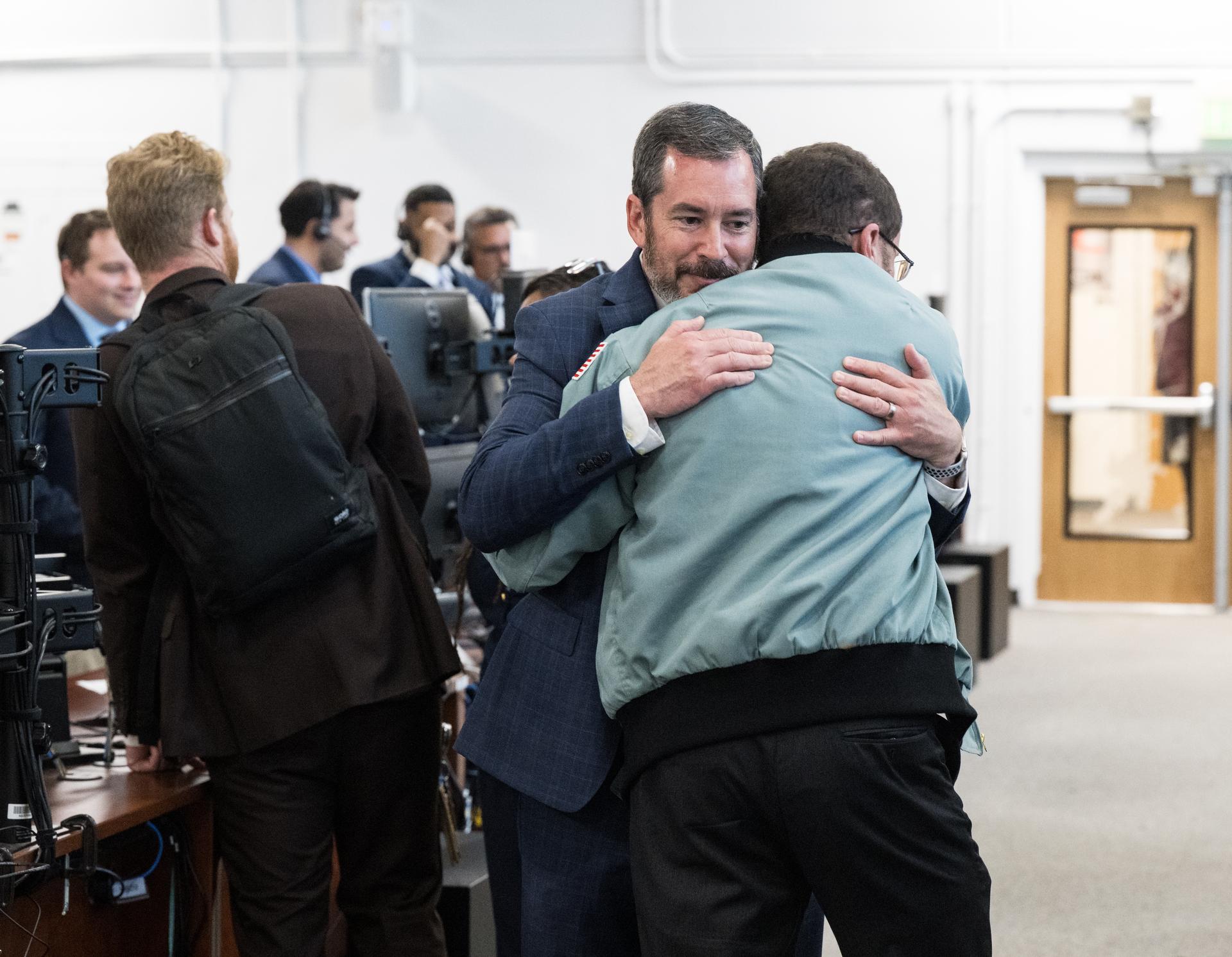 Teams celebrate after the launch of NASA’s Space Launch System (SLS) rocket and Orion spacecraft with NASA astronauts Reid Wiseman, commander; Victor Glover, pilot; Christina Koch, mission specialist; and CSA (Canadian Space Agency) astronaut Jeremy Hansen, mission specialist onboard the Artemis II mission in Firing Room 2 of the Rocco A. Petrone Launch Control Center, Wednesday, April 1, 2026, at NASA’s Kennedy Space Center in Florida. NASA’s Artemis II mission will take Wiseman, Glover, Koch, and Hansen on a 10-day journey around the Moon and back aboard SLS rocket and Orion spacecraft from Launch Complex 39B. The quartet launched at 6:35pm EDT. Photo Credit: (NASA/Aubrey Gemignani)
