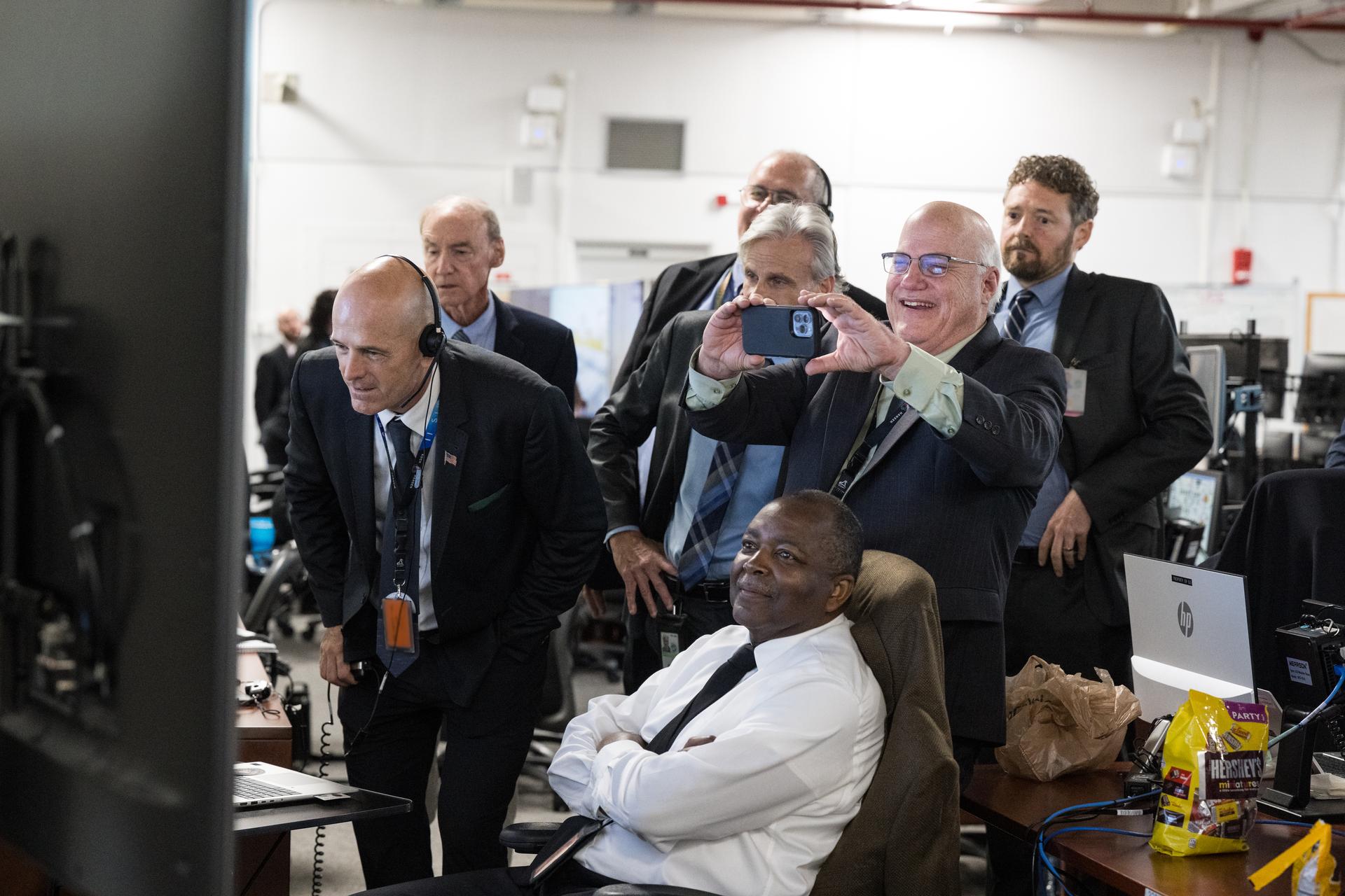 Teams review images of launch complex 39B after the launch of NASA’s Space Launch System (SLS) rocket and Orion spacecraft with NASA astronauts Reid Wiseman, commander; Victor Glover, pilot; Christina Koch, mission specialist; and CSA (Canadian Space Agency) astronaut Jeremy Hansen, mission specialist onboard on the Artemis II mission in Firing Room 2 of the Rocco A. Petrone Launch Control Center, Wednesday, April 1, 2026, at NASA’s Kennedy Space Center in Florida. NASA’s Artemis II mission will take Wiseman, Glover, Koch, and Hansen on a 10-day journey around the Moon and back aboard the SLS rocket and Orion spacecraft. The quartet launched at 6:35pm EDT . Photo Credit: (NASA/Aubrey Gemignani) NOTE - Portions of this image have been blurred for security reasons.