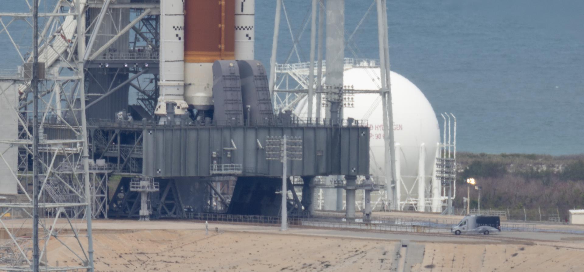 The astrovan with NASA astronauts Reid Wiseman, commander; Victor Glover, pilot; Christina Koch, mission specialist; and CSA (Canadian Space Agency) astronaut Jeremy Hansen, mission specialist, arrives at Launch Complex 39B ahead of the crew boarding their Orion spacecraft atop NASA’s Space Launch System (SLS) rocket, Wednesday, April 1, 2026, at NASA’s Kennedy Space Center in Florida. NASA’s Artemis II mission will take Wiseman, Glover, Koch, and Hansen on a 10-day journey around the Moon and back aboard SLS rocket and Orion spacecraft from Launch Complex 39B, with a two hour launch window opening at 6:24 p.m. EDT.  Photo Credit: (NASA/Joel Kowsky)
