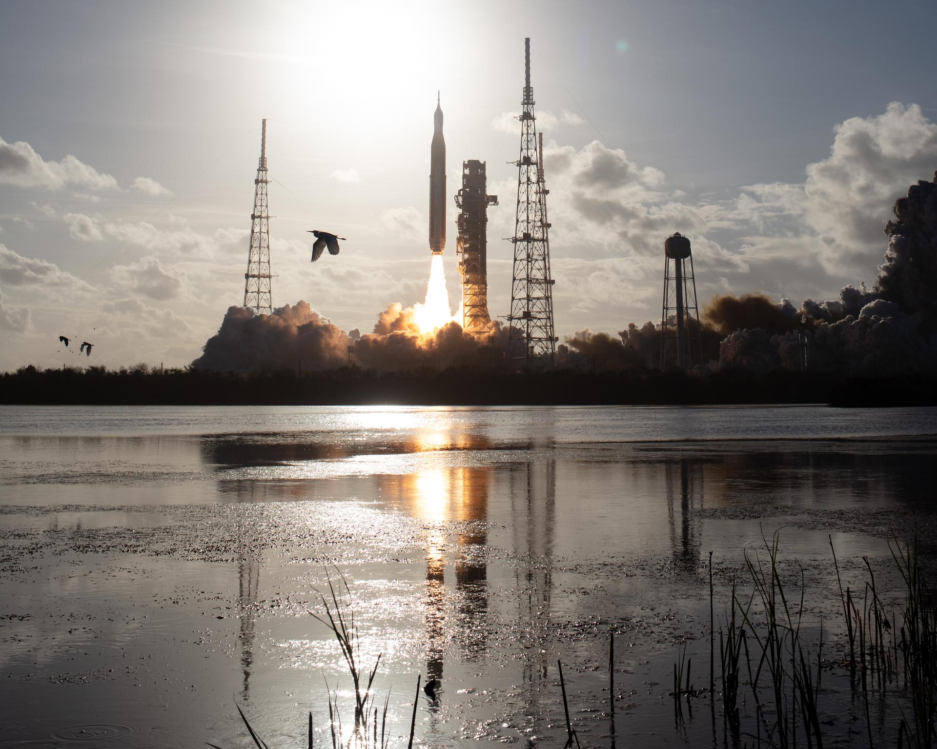 NASA’s Space Launch System rocket carrying the Orion spacecraft with NASA astronauts Reid Wiseman, commander; Victor Glover, pilot; Christina Koch, mission specialist; and CSA (Canadian Space Agency) astronaut Jeremy Hansen, mission specialist onboard launches on the Artemis II mission, Wednesday, April 1, 2026, from Launch Complex 39B at NASA’s Kennedy Space Center in Florida. NASA’s Artemis II mission will take Wiseman, Glover, Koch, and Hansen on a 10-day journey around the Moon and back aboard their Orion spacecraft. The quartet launched at 6:35 p.m. EDT, from Launch Complex 39B at the Kennedy Space Center. Photo Credit: (NASA/Joel Kowsky)