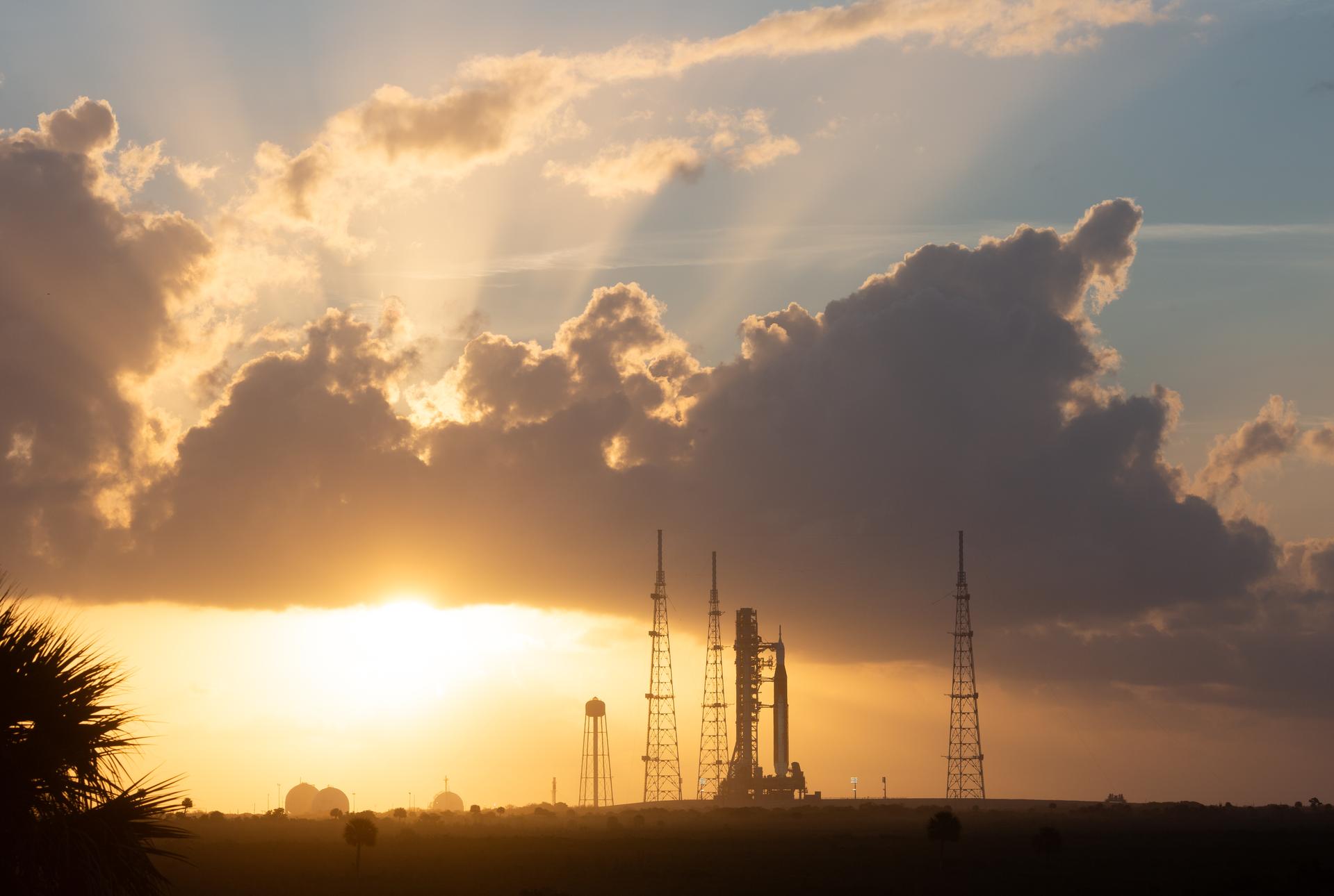 NASA’s Space Launch System rocket carrying the Orion spacecraft that will launch NASA astronauts Reid Wiseman, commander; Victor Glover, pilot; Christina Koch, mission specialist; and CSA (Canadian Space Agency) astronaut Jeremy Hansen, mission specialist on the Artemis II mission is seen at sunrise at Launch Complex 39B, Wednesday, April 1, 2026, at NASA’s Kennedy Space Center in Florida. NASA’s Artemis II mission will take Wiseman, Glover, Koch, and Hansen on a 10-day journey around the Moon and back aboard their Orion spacecraft. The quartet launched at 6:35 p.m. EDT, from Launch Complex 39B at the Kennedy Space Center. Photo Credit: (NASA/Joel Kowsky)