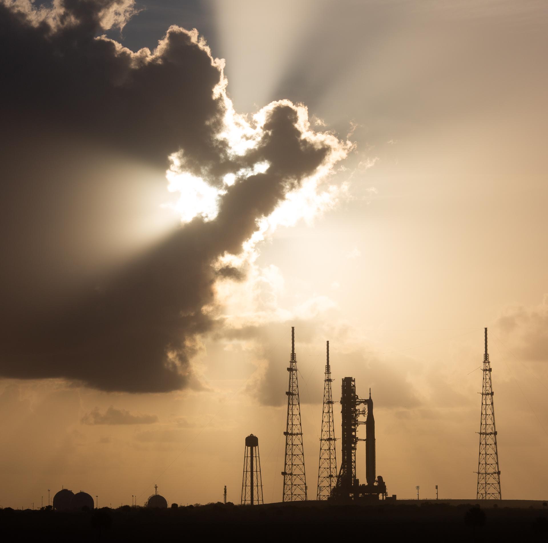 NASA’s Space Launch System rocket carrying the Orion spacecraft that will launch NASA astronauts Reid Wiseman, commander; Victor Glover, pilot; Christina Koch, mission specialist; and CSA (Canadian Space Agency) astronaut Jeremy Hansen, mission specialist on the Artemis II mission is seen at sunrise at Launch Complex 39B, Wednesday, April 1, 2026, at NASA’s Kennedy Space Center in Florida. NASA’s Artemis II mission will take Wiseman, Glover, Koch, and Hansen on a 10-day journey around the Moon and back aboard their Orion spacecraft. The quartet launched at 6:35 p.m. EDT, from Launch Complex 39B at the Kennedy Space Center. Photo Credit: (NASA/Joel Kowsky)