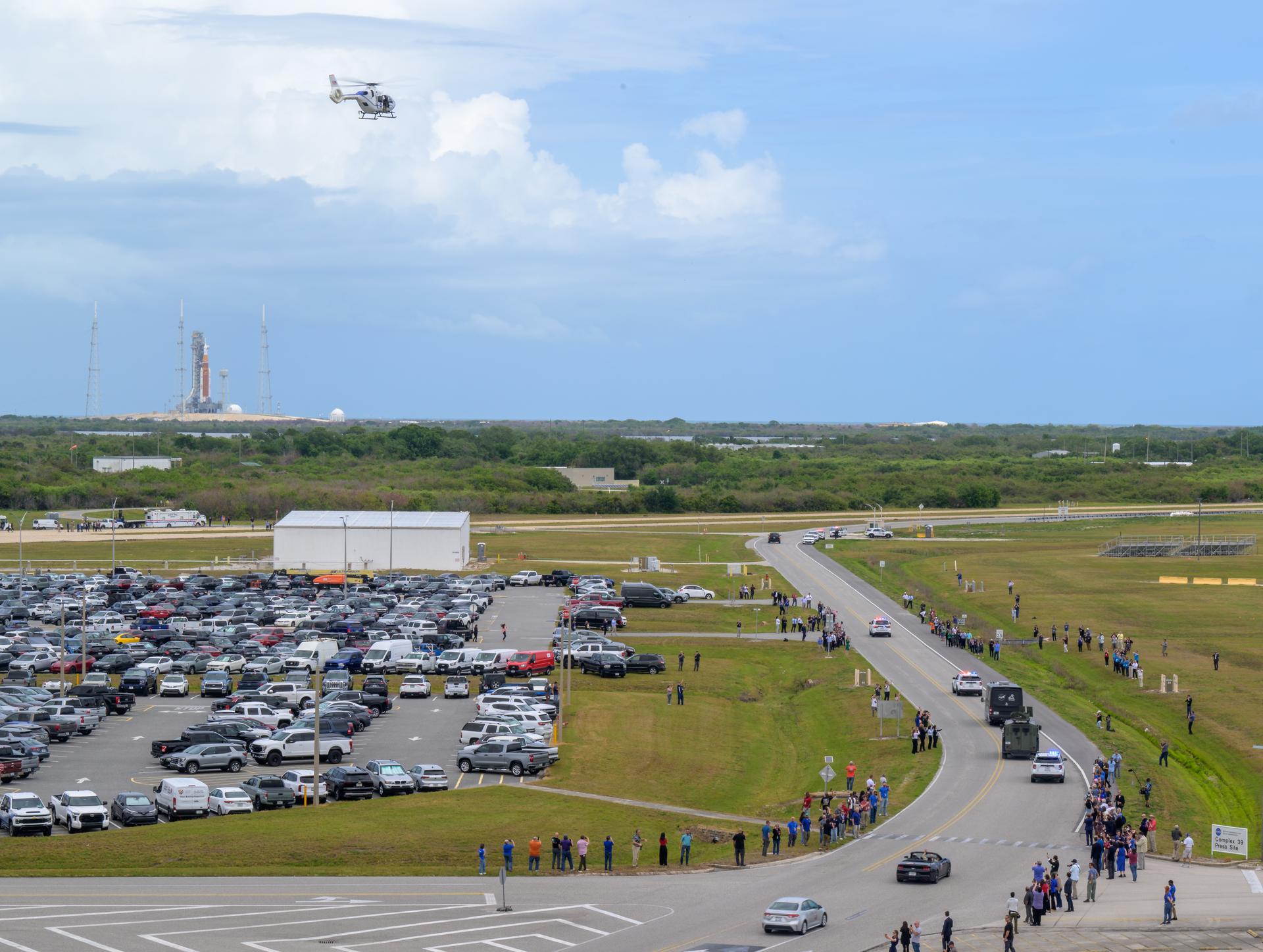 The astrovan with NASA astronauts Reid Wiseman, commander; Victor Glover, pilot; Christina Koch, mission specialist; and CSA (Canadian Space Agency) astronaut Jeremy Hansen, mission specialist drives to the launch pad ahead of the crew boarding their Orion spacecraft atop NASA’s Space Launch System (SLS) rocket at Launch Complex 39B, Wednesday, April 1, 2026, at NASA’s Kennedy Space Center in Florida. NASA’s Artemis II mission will take Wiseman, Glover, Koch, and Hansen on a 10-day journey around the Moon and back aboard their Orion spacecraft from Launch Complex 39B, with a two hour launch window opening at 6:24pm EDT. Photo Credit: (NASA/Bill Ingalls)