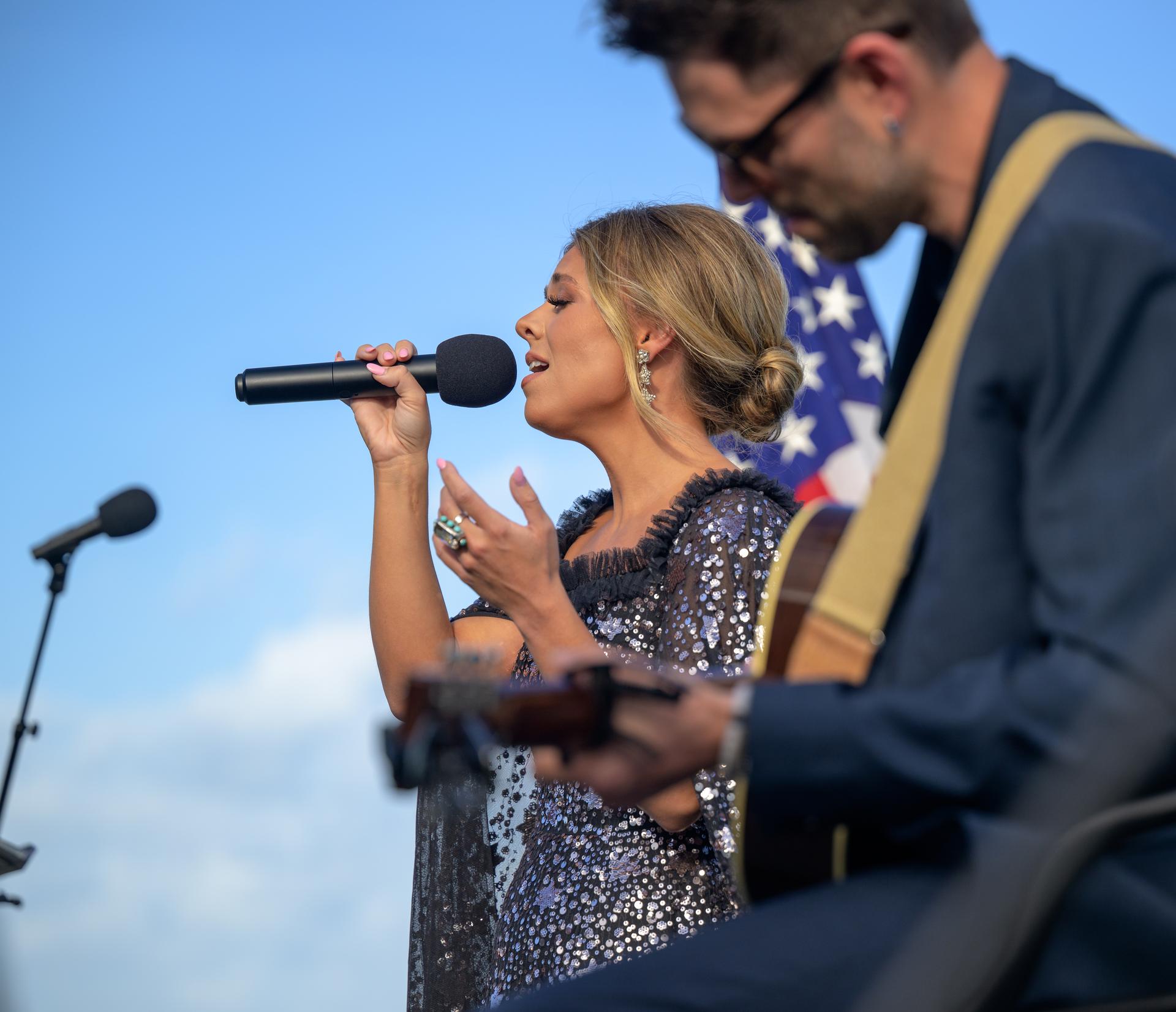 Country artist Anne Wilson sings the national anthem ahead of the launch of NASA’s Space Launch System rocket carrying the Orion spacecraft with NASA astronauts Reid Wiseman, commander; Victor Glover, pilot; Christina Koch, mission specialist; and CSA (Canadian Space Agency) astronaut Jeremy Hansen, mission specialist on NASA’s Artemis II mission, Wednesday, April 1, 2026, from Operations and Support Building II at NASA’s Kennedy Space Center in Florida. NASA’s Artemis II mission will take Wiseman, Glover, Koch, and Hansen on a 10-day journey around the Moon and back aboard SLS rocket and Orion spacecraft which launched at 6:35pm EDT from Launch Complex 39B. Photo Credit: (NASA/Bill Ingalls)