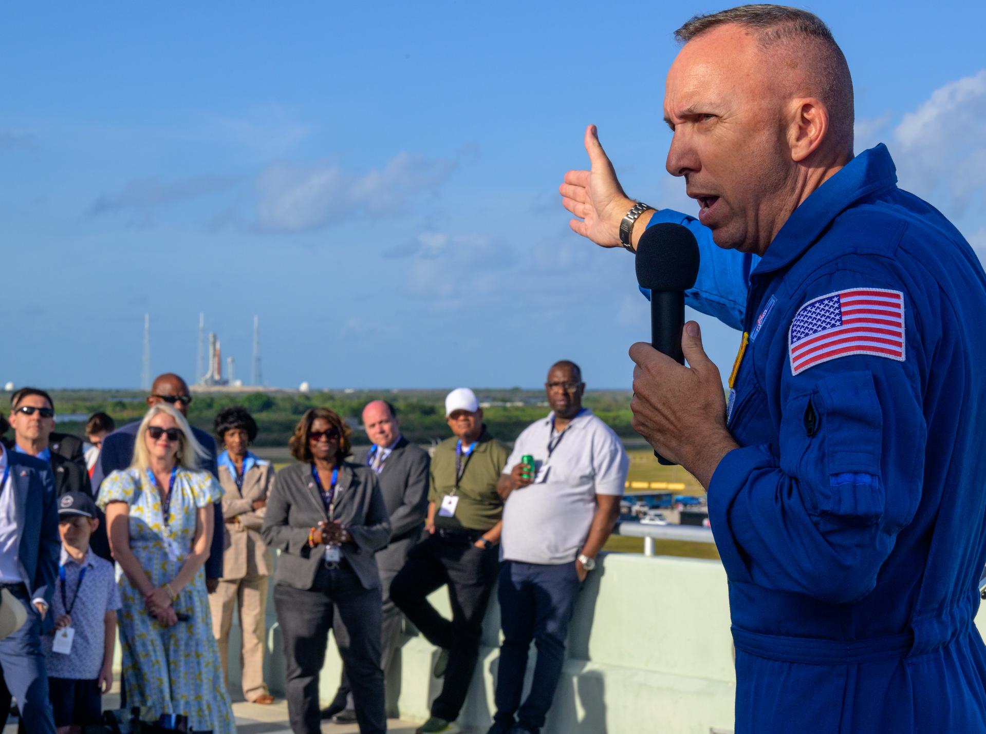 NASA astronaut Randy Bresnik gives remarks to guest ahead of the launch of NASA’s Space Launch System rocket carrying the Orion spacecraft with NASA astronauts Reid Wiseman, commander; Victor Glover, pilot; Christina Koch, mission specialist; and CSA (Canadian Space Agency) astronaut Jeremy Hansen, mission specialist on NASA’s Artemis II mission, Wednesday, April 1, 2026, from Operations and Support Building II at NASA’s Kennedy Space Center in Florida. NASA’s Artemis II mission will take Wiseman, Glover, Koch, and Hansen on a 10-day journey around the Moon and back aboard SLS rocket and Orion spacecraft which launched at 6:35pm EDT from Launch Complex 39B. Photo Credit: (NASA/Bill Ingalls)