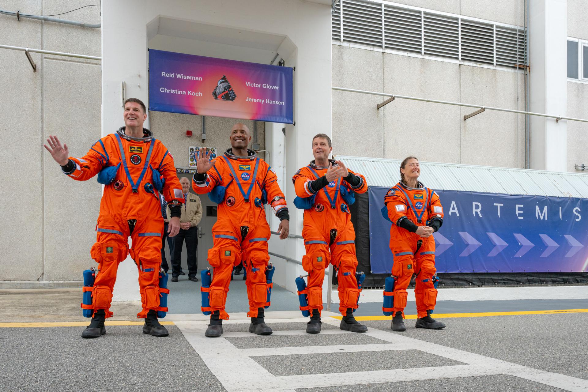 Artemis II astronauts Mission Specialist Jeremy Hansen from the CSA (Canadian Space Agency) and Pilot Victor Glover, Commander Reid Wiseman, and Mission Specialist Christina Koch from NASA are seen as they prepare to depart the Neil A. Armstrong Operations and Checkout Building for Launch Complex 39B at Kennedy Space Center to board NASA’s Artemis II Space Launch System (SLS) rocket and Orion spacecraft for the Artemis II launch, Wednesday, Apr. 1, 2026, at NASA’s Kennedy Space Center in Florida. NASA’s Artemis II test flight will take Wiseman, Glover, Koch, and Hansen around the Moon and back to Earth no earlier than April 1, 2026. Photo Credit: (NASA/John Kraus)