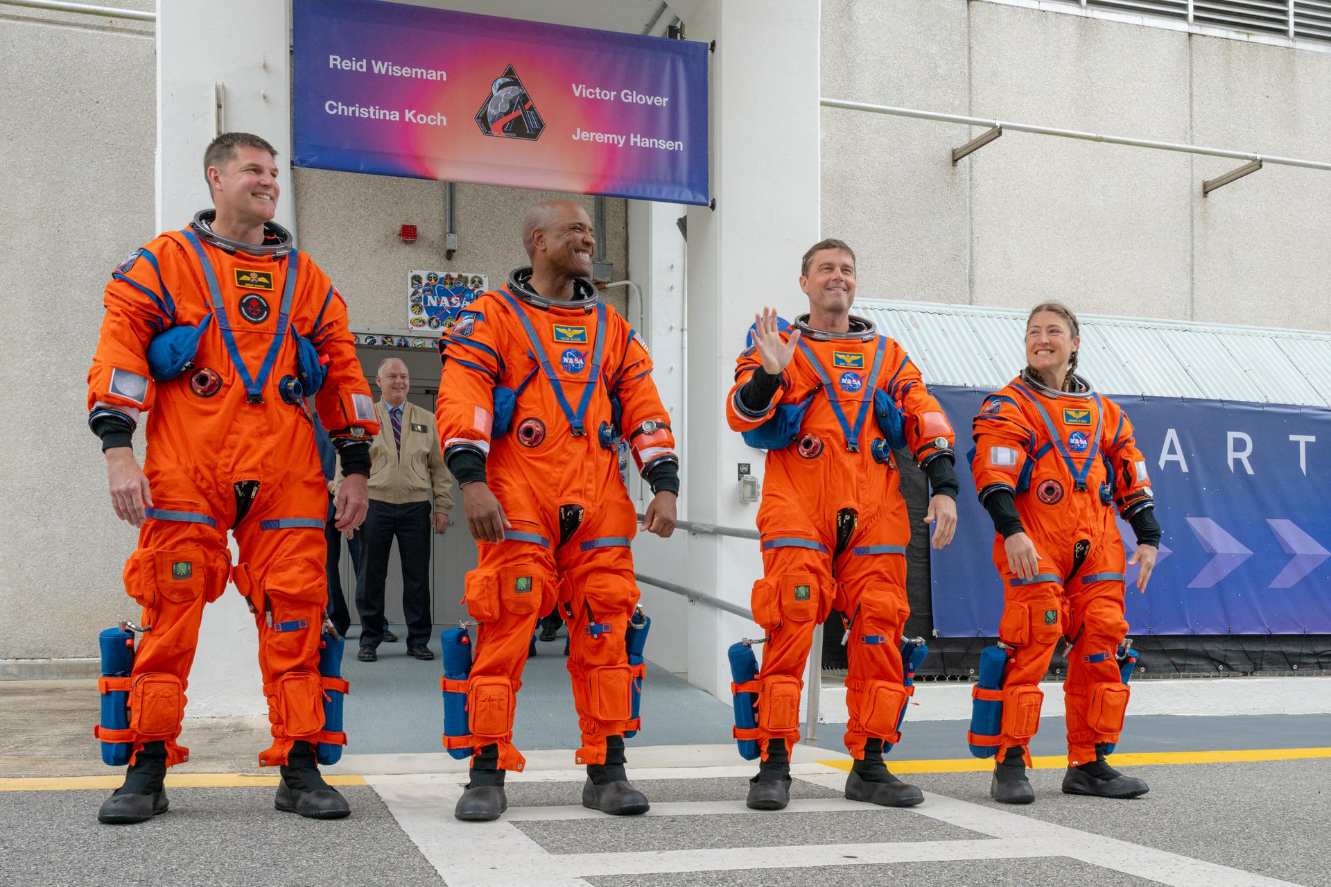 Artemis II astronauts Mission Specialist Jeremy Hansen from the CSA (Canadian Space Agency) and Pilot Victor Glover, Commander Reid Wiseman, and Mission Specialist Christina Koch from NASA are seen as they prepare to depart the Neil A. Armstrong Operations and Checkout Building for Launch Complex 39B at Kennedy Space Center to board NASA’s Artemis II Space Launch System (SLS) rocket and Orion spacecraft for the Artemis II launch, Wednesday, Apr. 1, 2026, at NASA’s Kennedy Space Center in Florida. NASA’s Artemis II test flight will take Wiseman, Glover, Koch, and Hansen around the Moon and back to Earth no earlier than April 1, 2026. Photo Credit: (NASA/John Kraus)