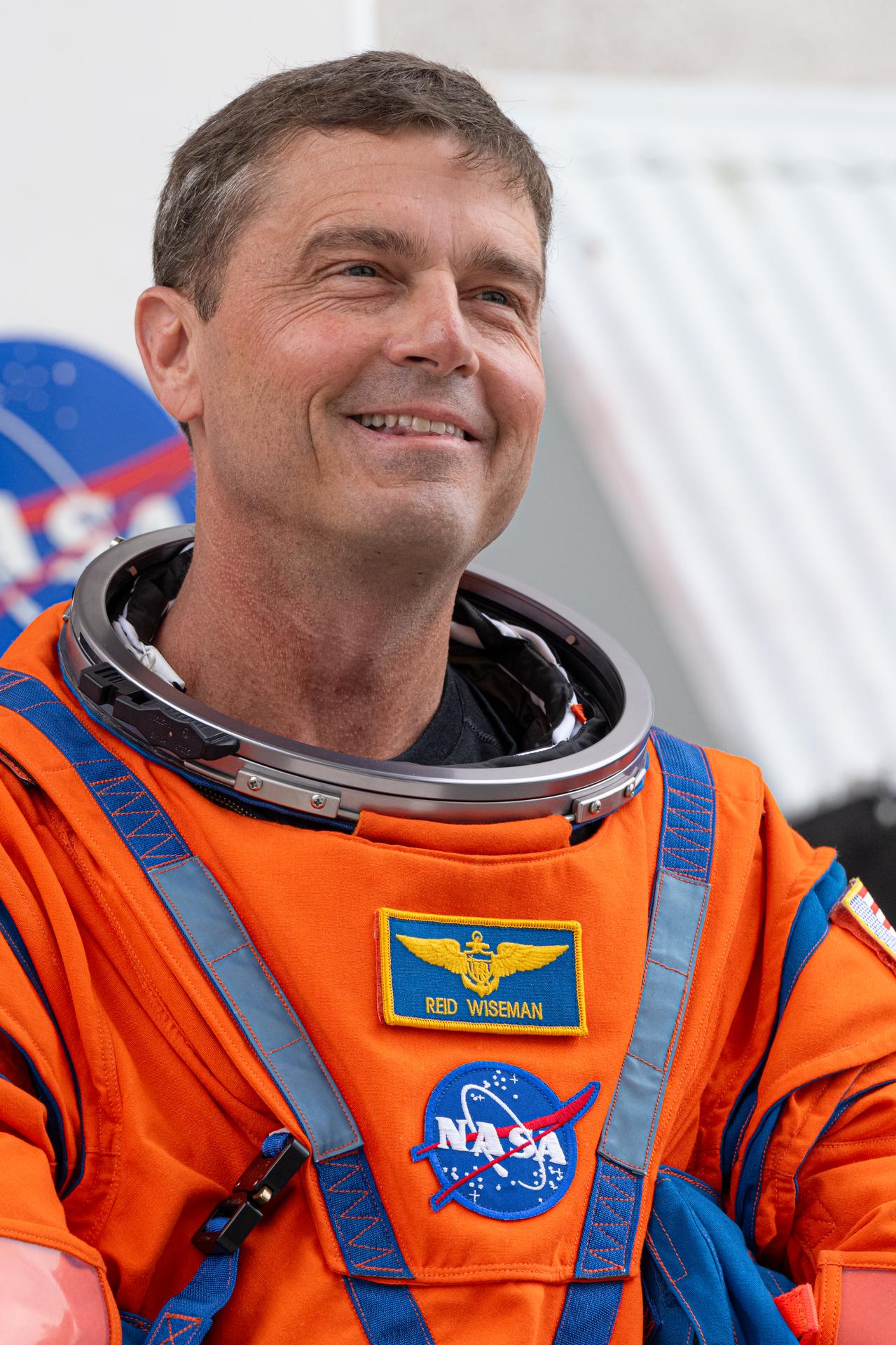 Artemis II astronaut Commander Reid Wiseman is seen as the Artemis II crew prepares to depart the Neil A. Armstrong Operations and Checkout Building for Launch Complex 39B at Kennedy Space Center to board NASA’s Artemis II Space Launch System (SLS) rocket and Orion spacecraft for the Artemis II launch, Wednesday, Apr. 1, 2026, at NASA’s Kennedy Space Center in Florida. NASA’s Artemis II test flight will take Commander Reid Wiseman, Pilot Victor Glover, and Mission Specialist Christina Koch from NASA, and Mission Specialist Jeremy Hansen from the CSA (Canadian Space Agency), around the Moon and back to Earth no earlier than April 1, 2026. Photo Credit: (NASA/John Kraus)