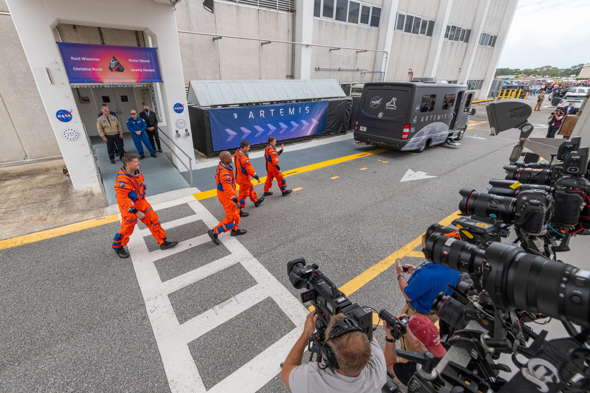 Artemis II astronauts Mission Specialist Jeremy Hansen from the CSA (Canadian Space Agency) and Pilot Victor Glover, Commander Reid Wiseman, and Mission Specialist Christina Koch from NASA are seen as they prepare to depart the Neil A. Armstrong Operations and Checkout Building for Launch Complex 39B at Kennedy Space Center to board NASA’s Artemis II Space Launch System (SLS) rocket and Orion spacecraft for the Artemis II launch, Wednesday, Apr. 1, 2026, at NASA’s Kennedy Space Center in Florida. NASA’s Artemis II test flight will take Wiseman, Glover, Koch, and Hansen around the Moon and back to Earth no earlier than April 1, 2026. Photo Credit: (NASA/John Kraus)
