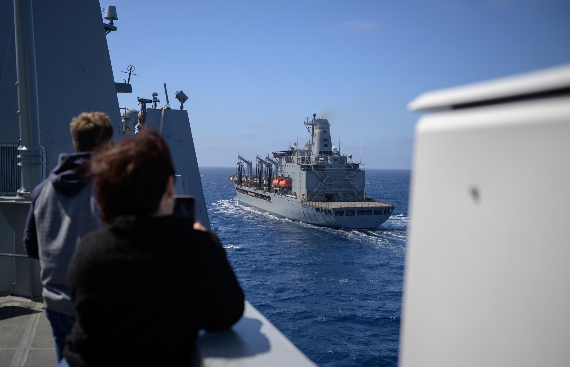 The USNS Guadalupe (T-AO 200) replenishment oiler prepares to refuel USS John P. Murtha (LPD 26) as NASA, U.S. Navy, and U.S. Air Force teams head into the Pacific Ocean for the return of the Artemis II crewmembers to Earth, Monday, April 6, 2026, in the Pacific Ocean off the coast of California. NASA’s Artemis II mission is taking NASA astronauts Reid Wiseman, commander; Victor Glover, pilot; Christina Koch, mission specialist; and CSA (Canadian Space Agency) astronaut Jeremy Hansen, mission specialist on a 10-day journey around the Moon and back aboard their Orion spacecraft. Wiseman, Glover, Koch, and Hansen are scheduled to splash down off the coast of San Diego at approximately 5:07 p.m. PDT (8:07 p.m. EDT) on Friday, April 10.  Photo Credit: (NASA/Bill Ingalls)